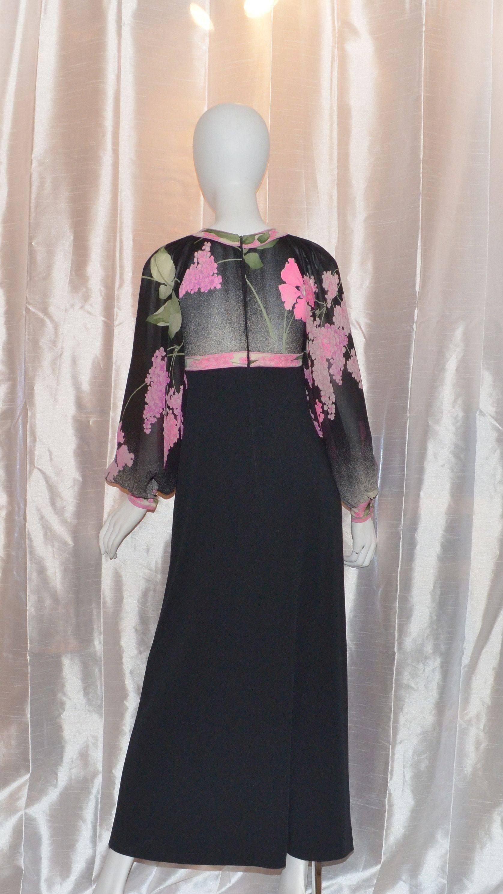 Leonard Paris Floral Chiffon Sleeve Gown

Leonard Paris gown features a cross-heart neckline with a floral print on a jersey bodice and a sheer billow sleeve. Dress has a back zipper closure. Made in France. Measurements are as follows:

Garment