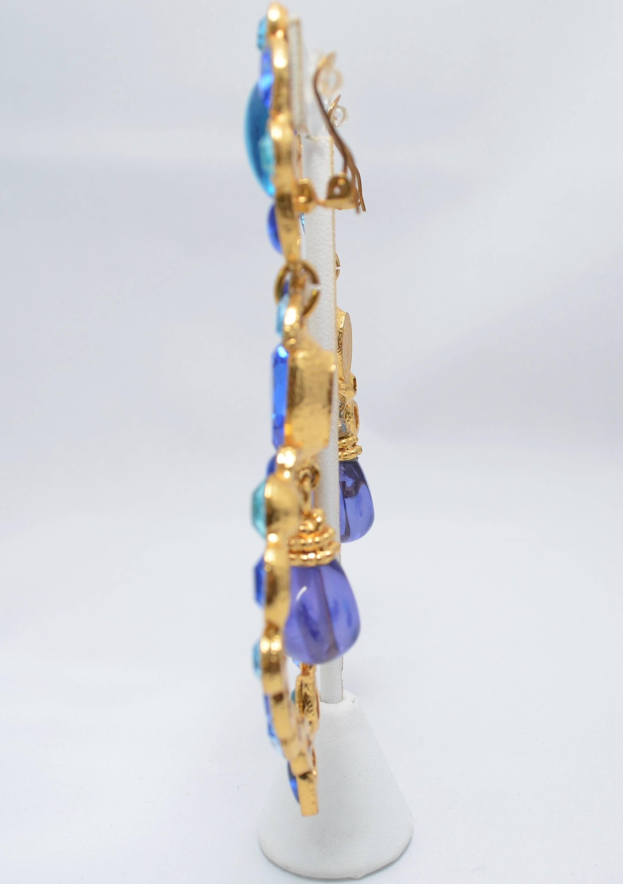 Gorgeous Yves Saint Laurent Runway 1980's massive blue heart shape drop earrings with Gripoix drop, flower top and gold frames. Made in France and marked with the Yves Saint Laurent Rive Gauche stamp. Gorgeous!