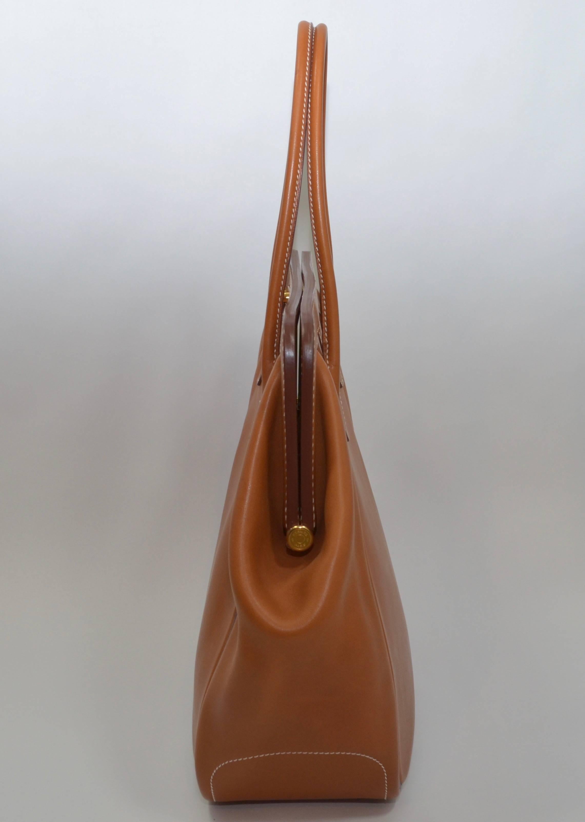 Hermes large GM Convoyeur top handle handbag from 2014

Newly design from Hermes. Introduced in 2013. Inspired by security cash bags. Overall excellent condition. Rare and desirable Barenia leather does show some faint markings. 

