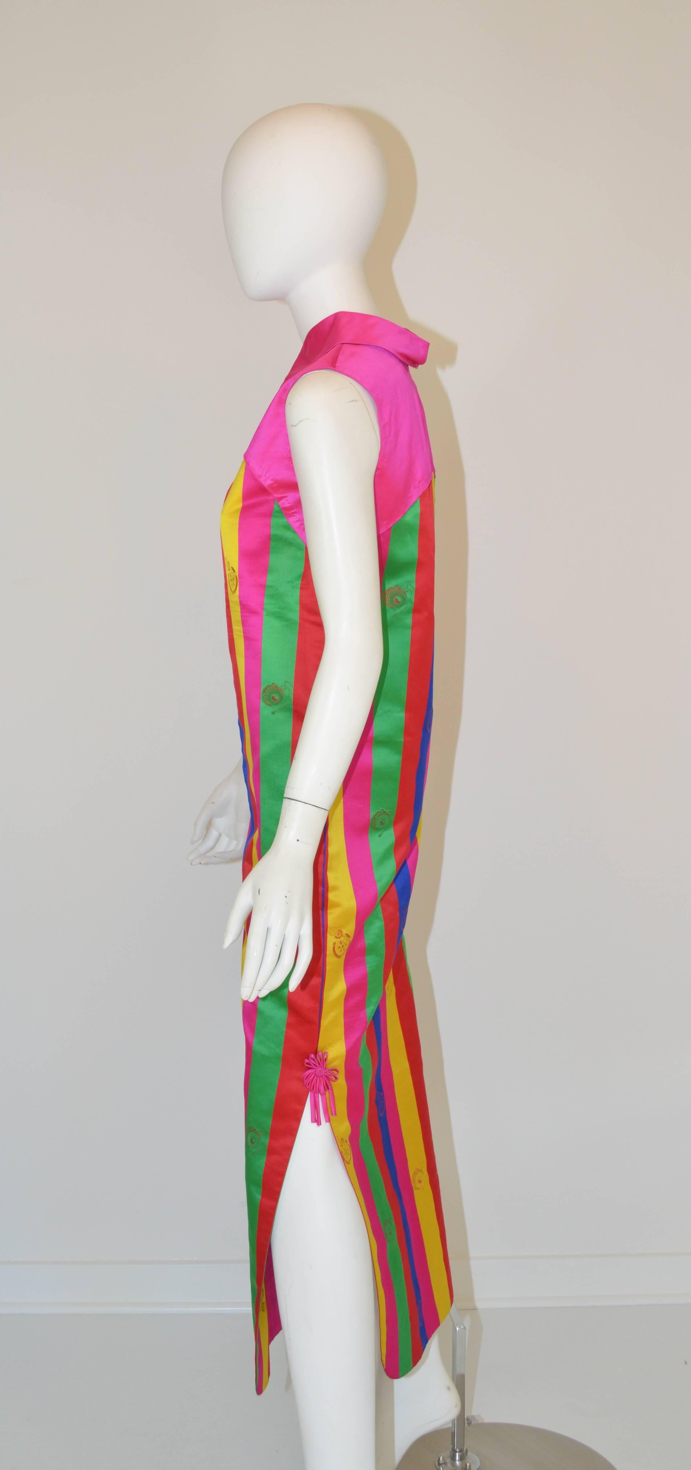 Nora Noh Korean Designer 1960's Silk Gown made from Korean imperial printed silk. 

Nora Noh is the subject of the 2013 Documentary where she is portrayed as one of Korea's greatest designers and the first female Korean designer.

Measurements:
Bust