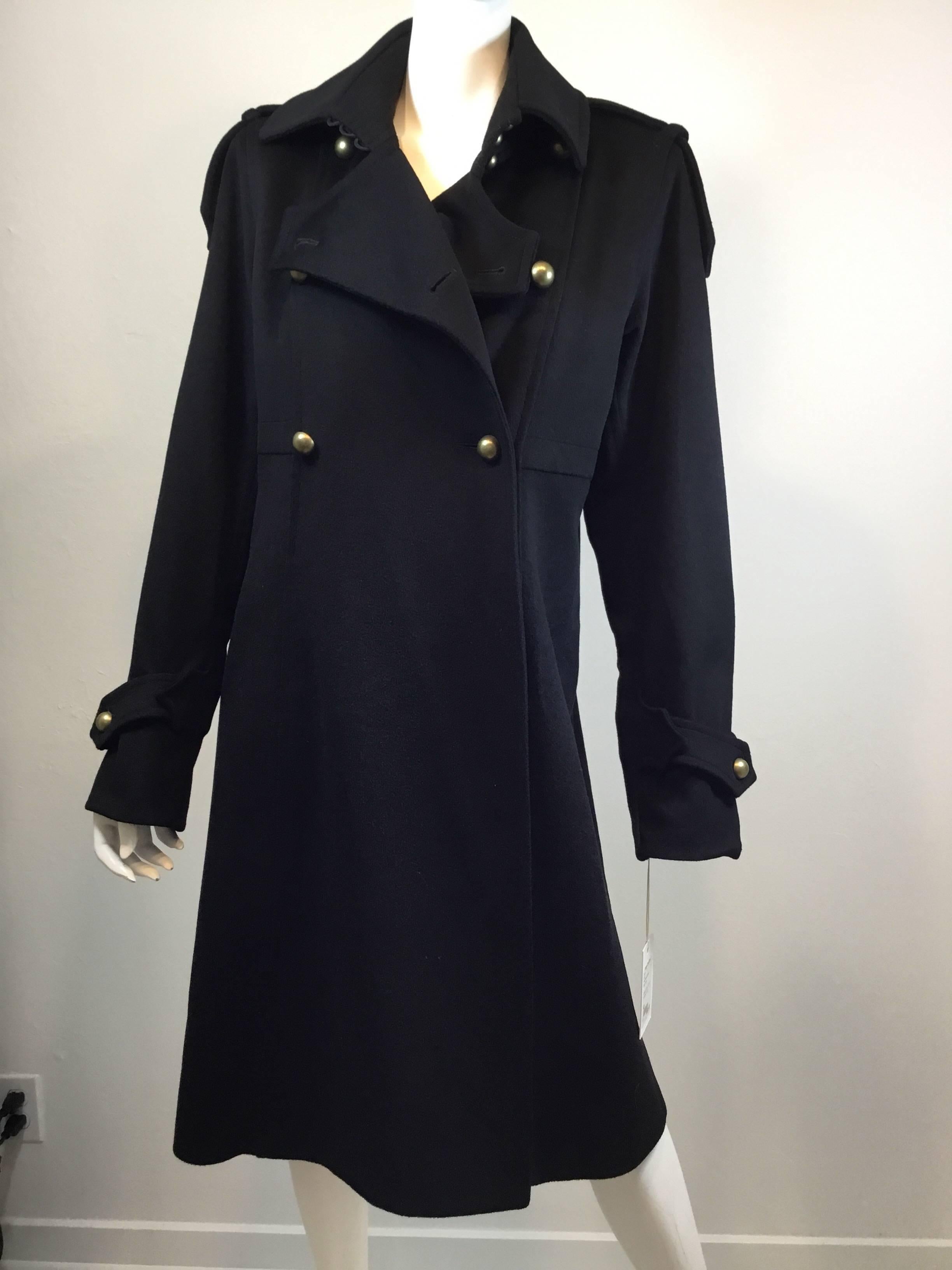 Yves Saint Laurent Rive Gauche wool coat in a classic military style. Epaulettes, gold buttons, double breasted, welted seams, fully lined, front pockets. Perfect to keep you warm and stylish. Made in France of 100% wool. Size 42 or US 8. Excellent