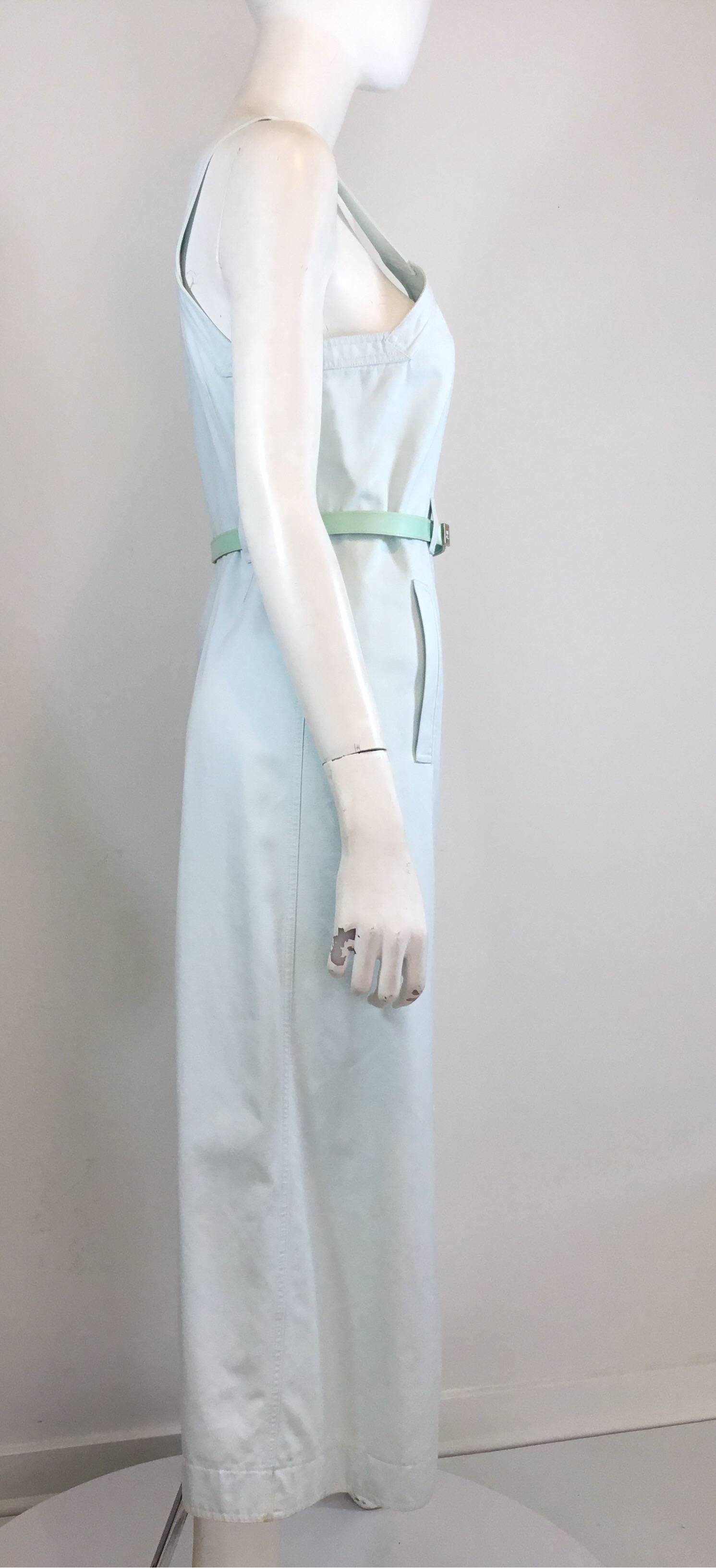 Courreges vintage cotton dress in light blue with button and belted closures and pockets at the high waist. Dress is made of 100% cotton and made in France.

Measurements:
Bust- 35''
Waist- 30''
Hips- 35''
Length- 43.5''