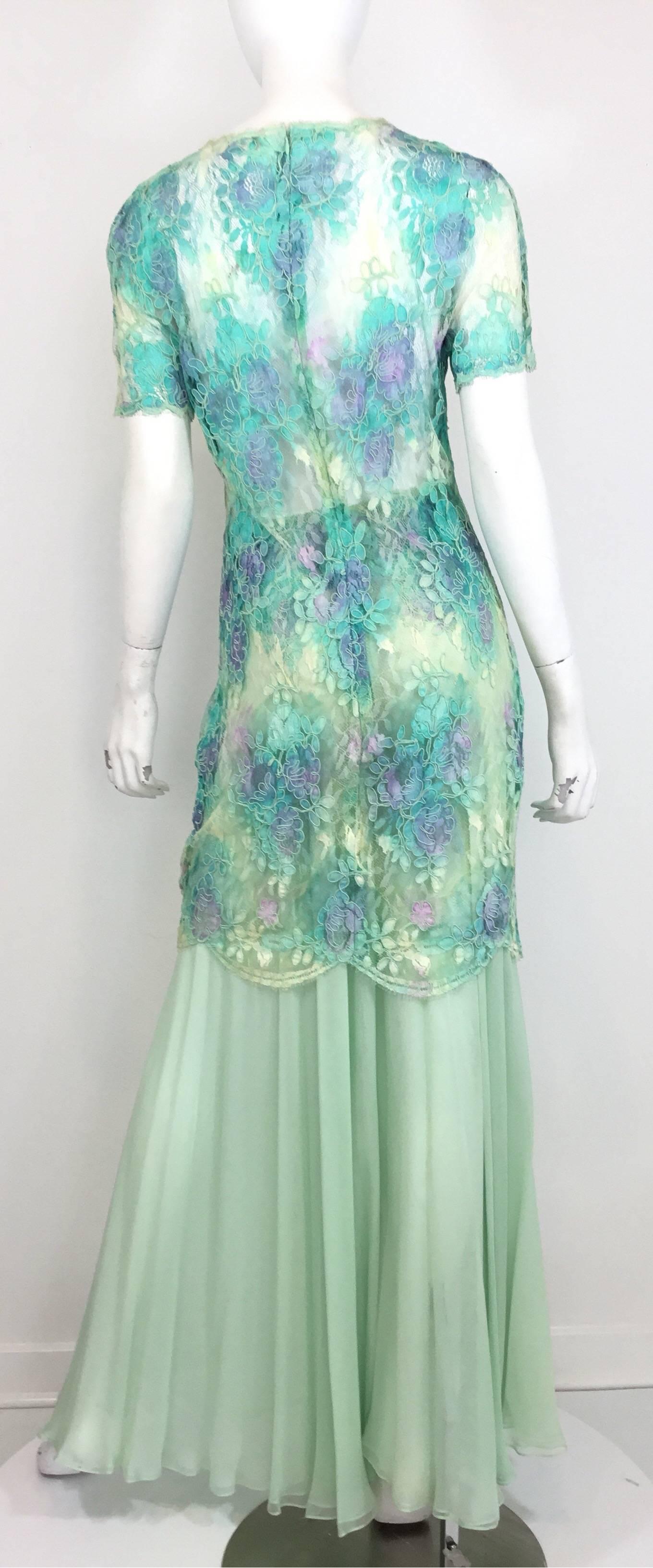 Beautiful multicolored lace dress cover has a back zipper fastening. Sheer pants feature a lace trim along the waistline and has a back zipper closure. 

Dress cover: bust 34'', waist 30'', hips 36'', length 36''
Pants: waist 26'', hips 34'', length