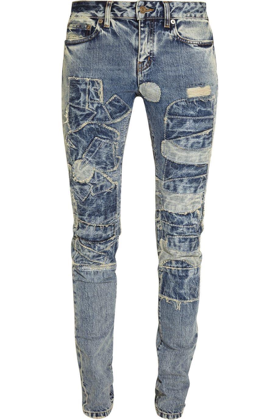 Saint Laurent distressed jeans with patchwork detail throughout, functional front and back pockets. Jeans are a size 28, made in Italy, 100% Cotton.

 Measurements:
Waist 30”, hips 35”, inseam 32.5”, rise 9.5”, length 42”