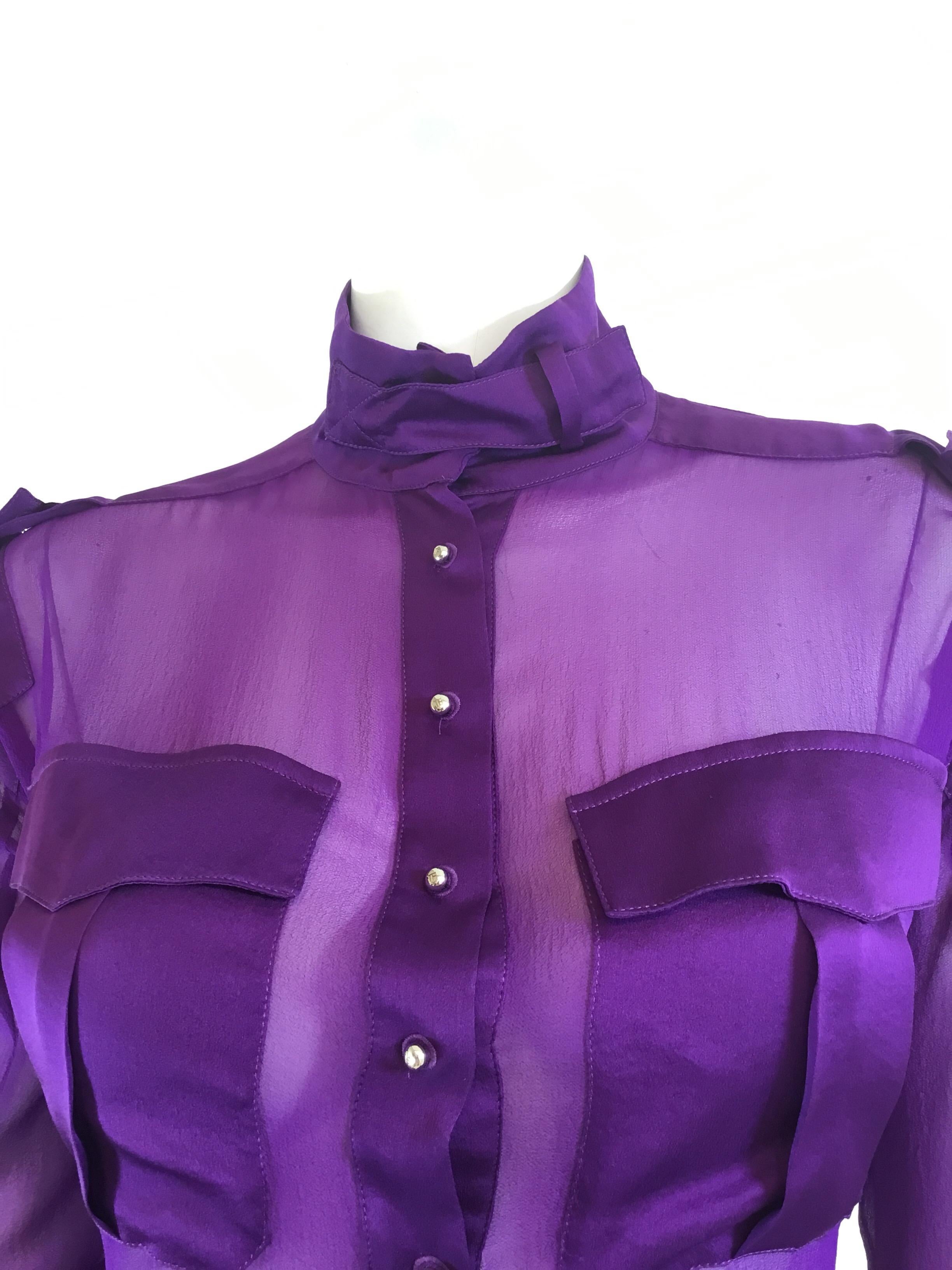 Tom Ford Silk blouse festured in purple with silver tone button closures, epaulette shoulders, and patch pockets. Blouse is labeled a size 42, 100% silk, and made in Italy. 

Measurements:
Bust 42”, sleeves 23”, shoulder to shoulder 21”, length 25”