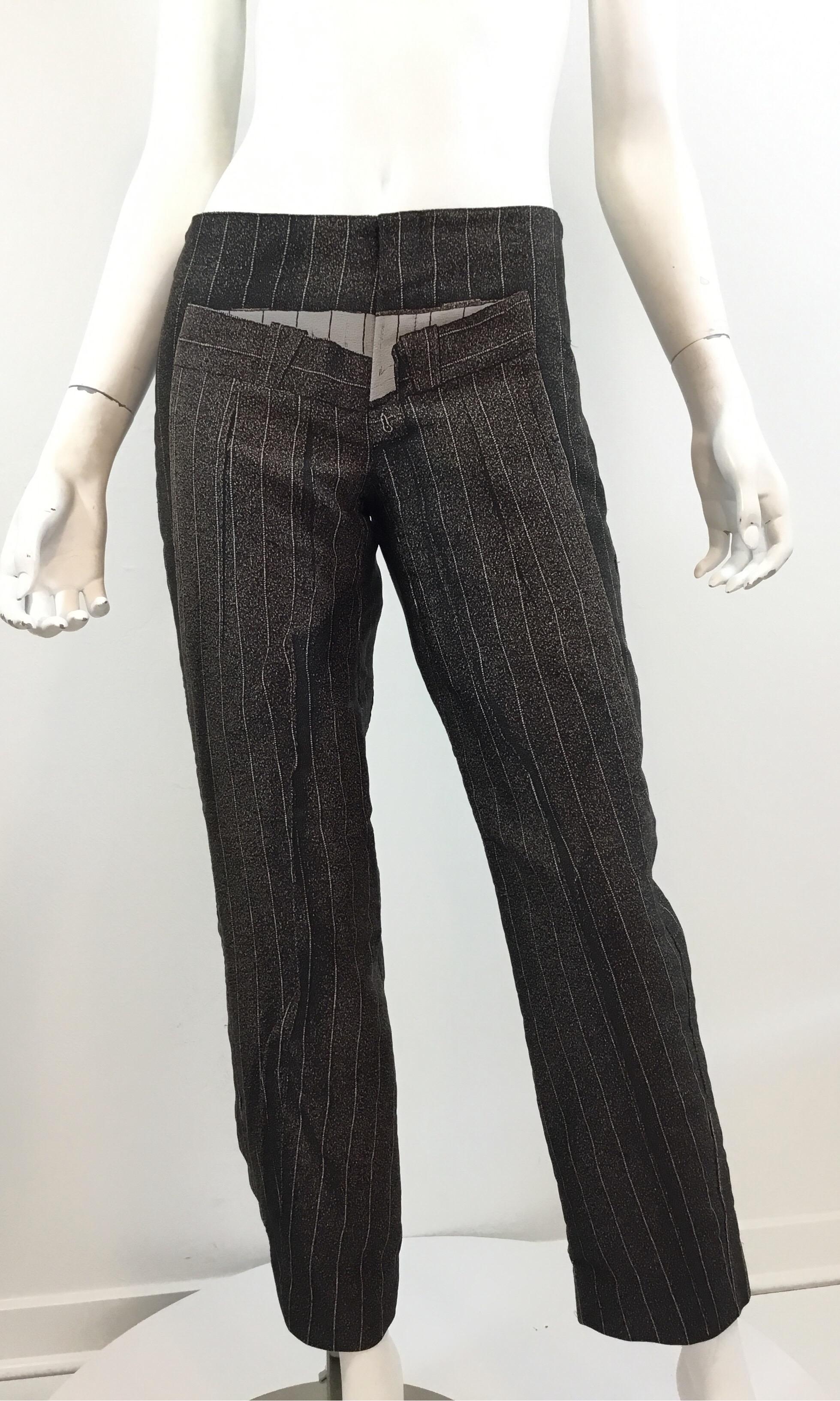 Jean Paul Gaultier pants on pants print design with pinstripes. Pants are a size 6, made in Italy. 100% polyester. 

Waist 30”, hips 36”, inseam 29”, rise 9.5”, length 37”