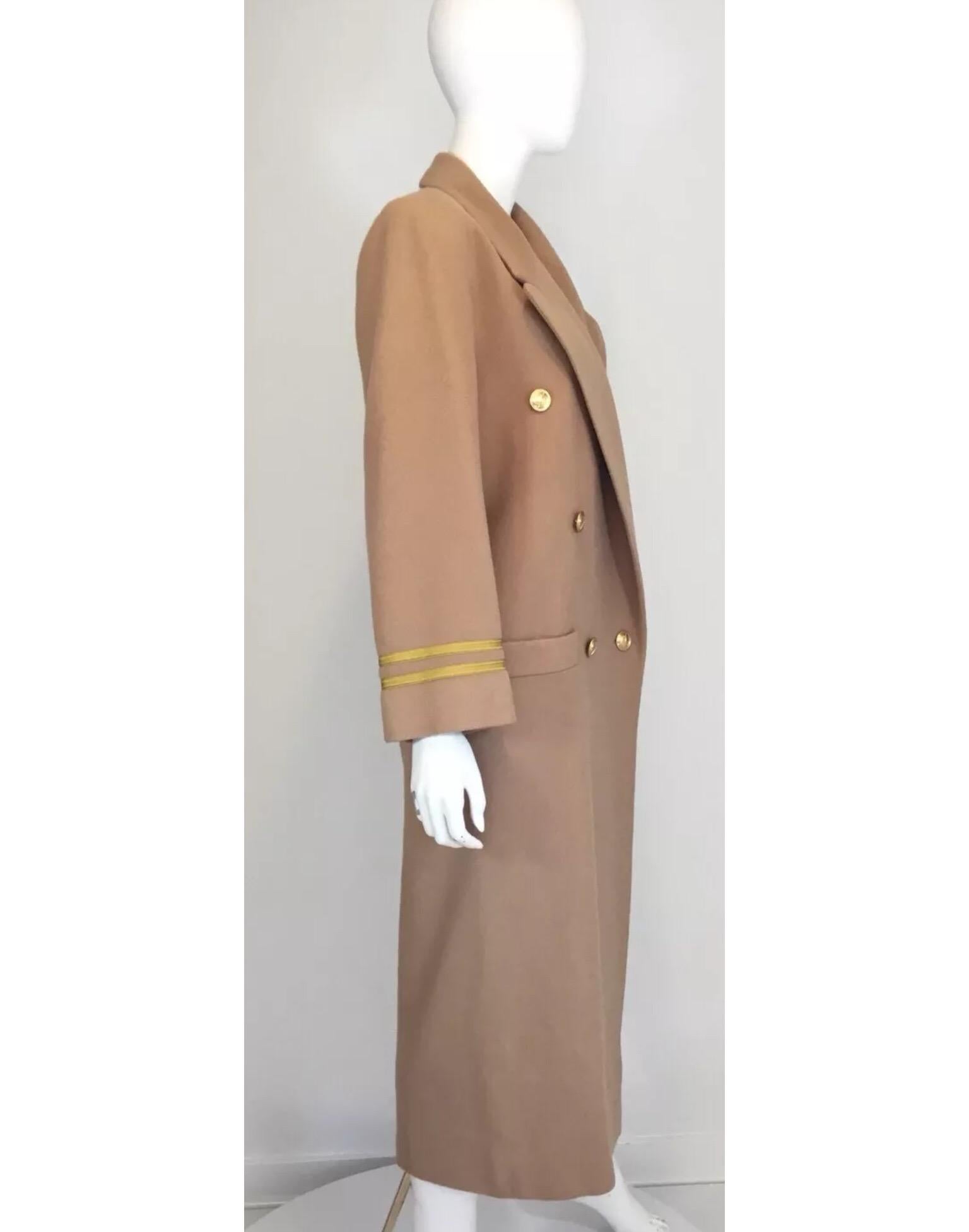 Christian Dior Coat

• Gold button closures at the front

• Slip pockets at the waist

• Fully lined

• Bust 44’’, sleeves 23”, shoulder to shoulder 17”, waist 42”, length 50”
