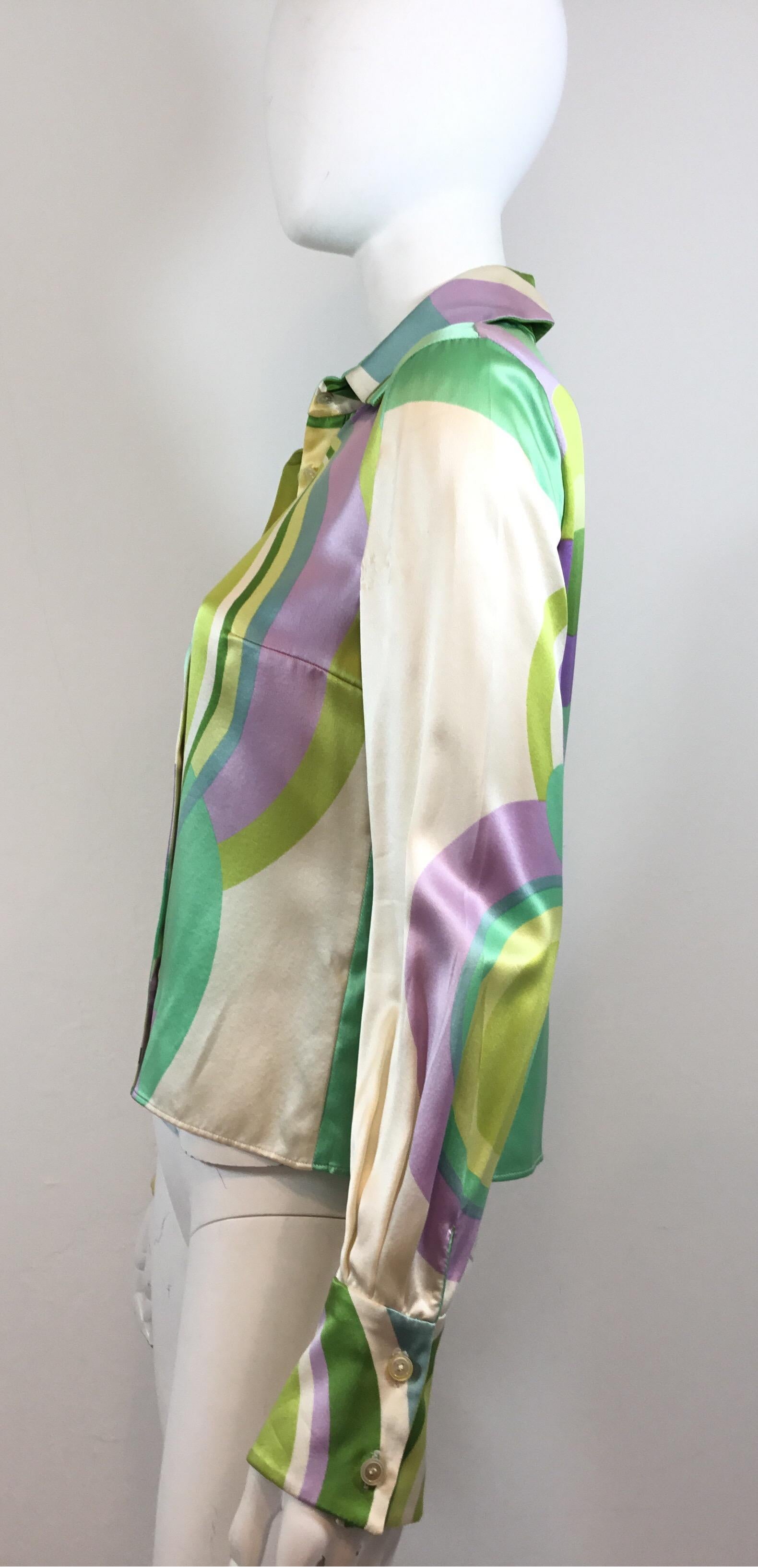 Vintage Gianni Versace Couture blouse featured in a pastel color palette, 100% satin silk with button fastenings. Made in Italy. Blouse has some wears to the silk along the sleeves. 

Bust 36”, Sleeves 25”, length 22”, shoulder to shoulder 16”