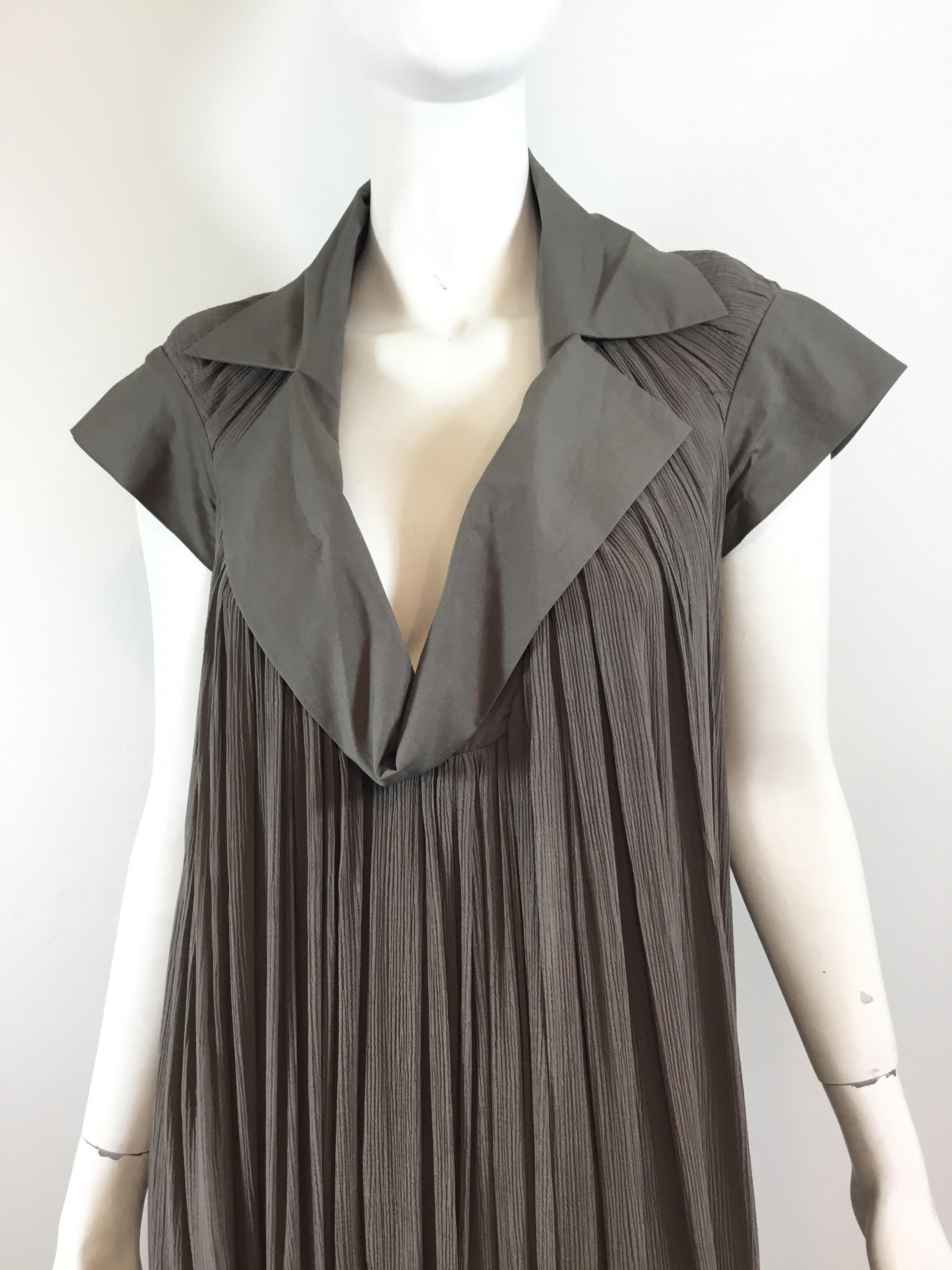 Bottega Veneta Taupe Cotton Dress with a chiffon overlay designed by creative director, Tomas Maier for Bottega Veneta’s 2008 Spring/Summer collection. Dress has a concealed back zipper fastening, labeled size 38, composed of 69% cotton and 31%