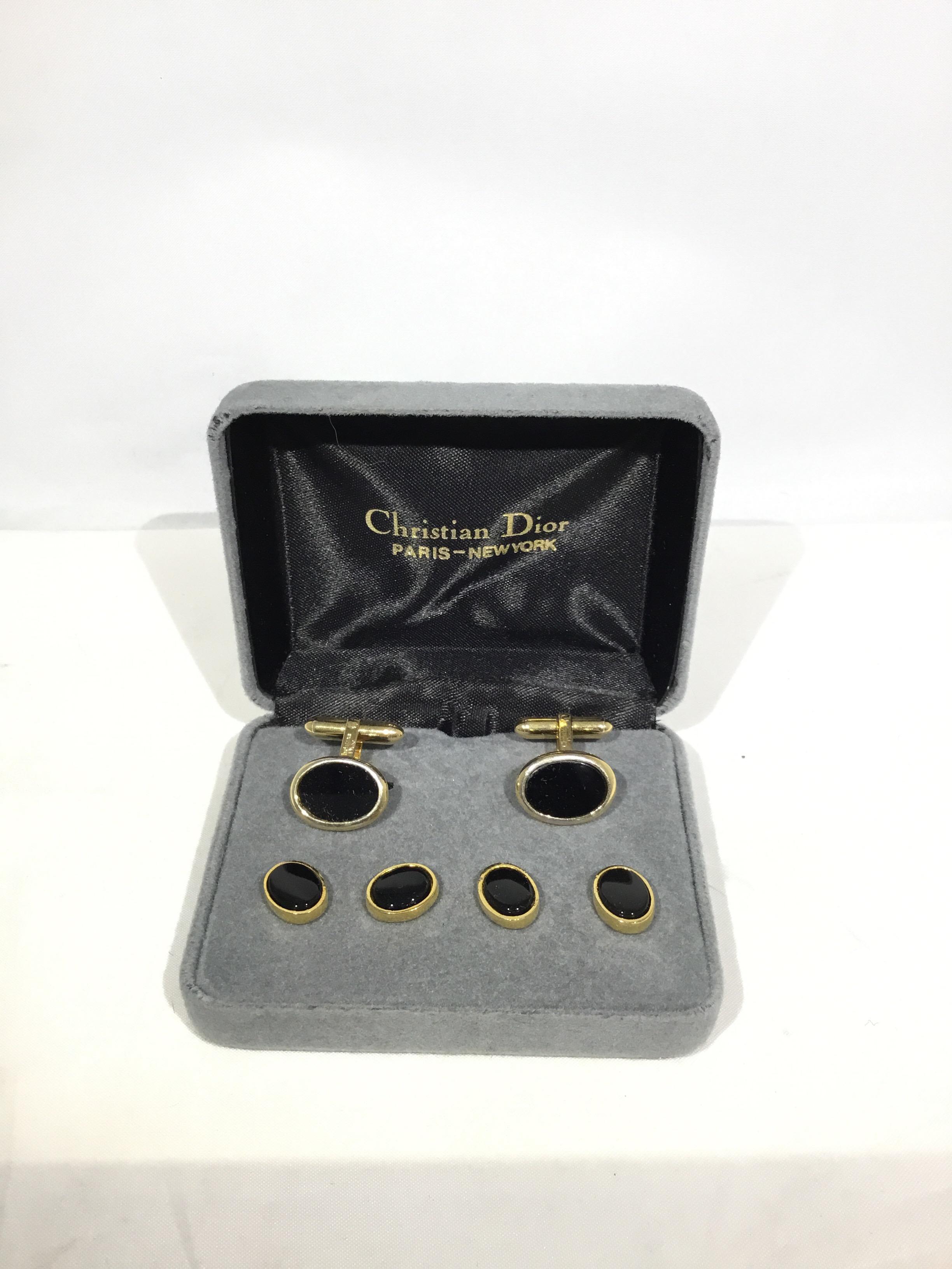 Vintage Christian Dior 1970’s cufflinks in goldtone metal and black center. Original box is included with 6 cufflinks total. Excellent condition.