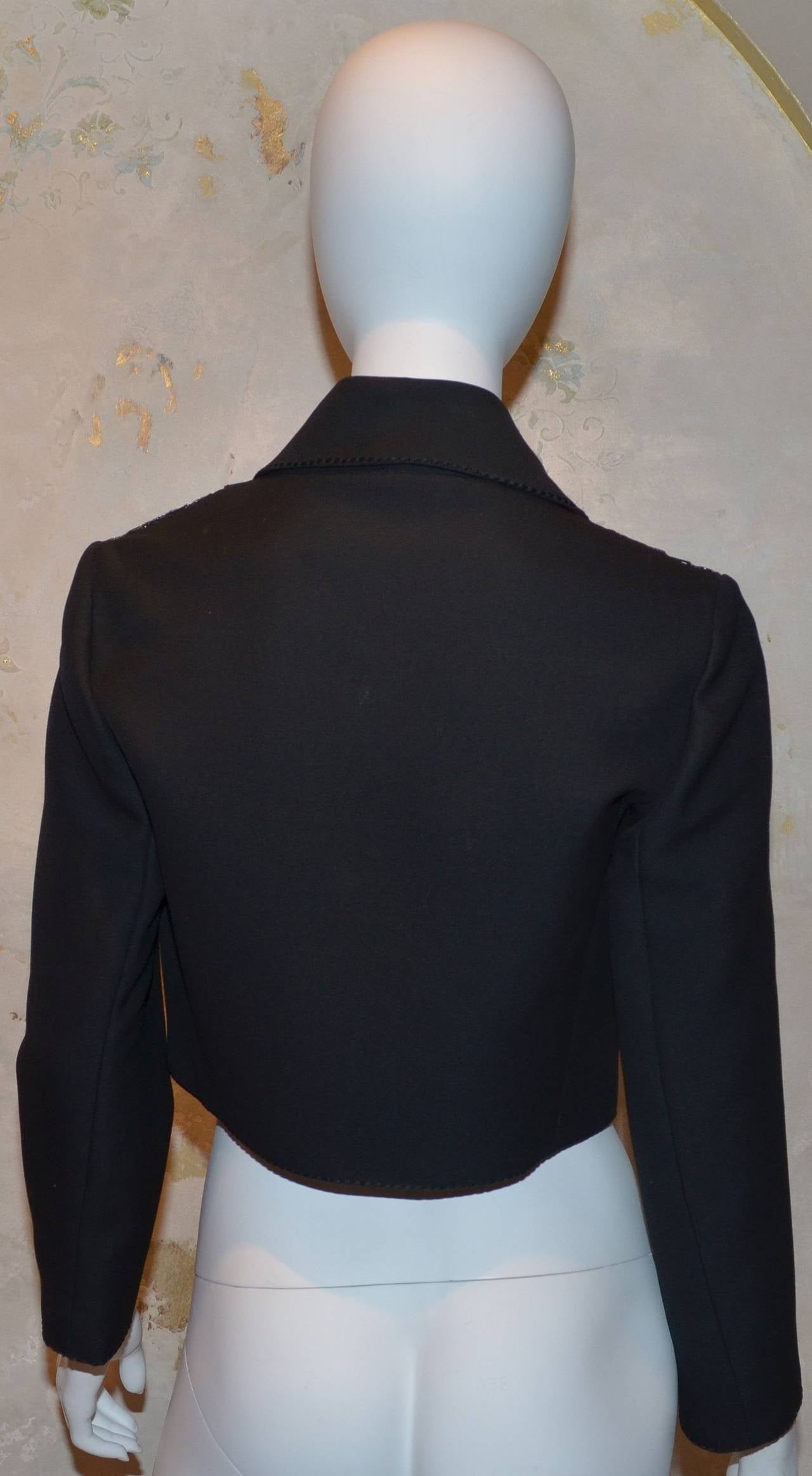 Vintage Structured Wool Boutique Vintage Pierre Balmain Caroline Campbell Jacket features a unique black circular patent material at the front, fully lined jacket in excellent vintage condition.

Measurements: 
Bust - 38'' 
Sleeves - 22''