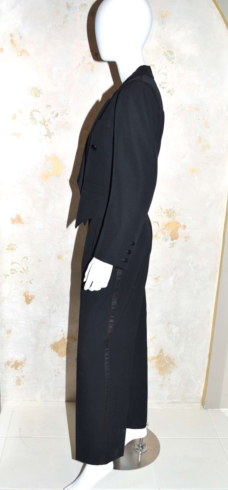 Yves Saint Laurent Vintage Late 1970's Early1980's Black Le Smoking Tuxedo Pantsuit
Wool with satin trim.
Jacket is a 42, Pants are a 40