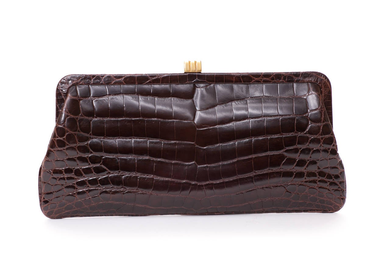 Lambertson Truex Alligator Clutch
Iconic minimalist clutch is made with genuine glazed alligator
Comes with dustbag.
This item is guaranteed authentic.