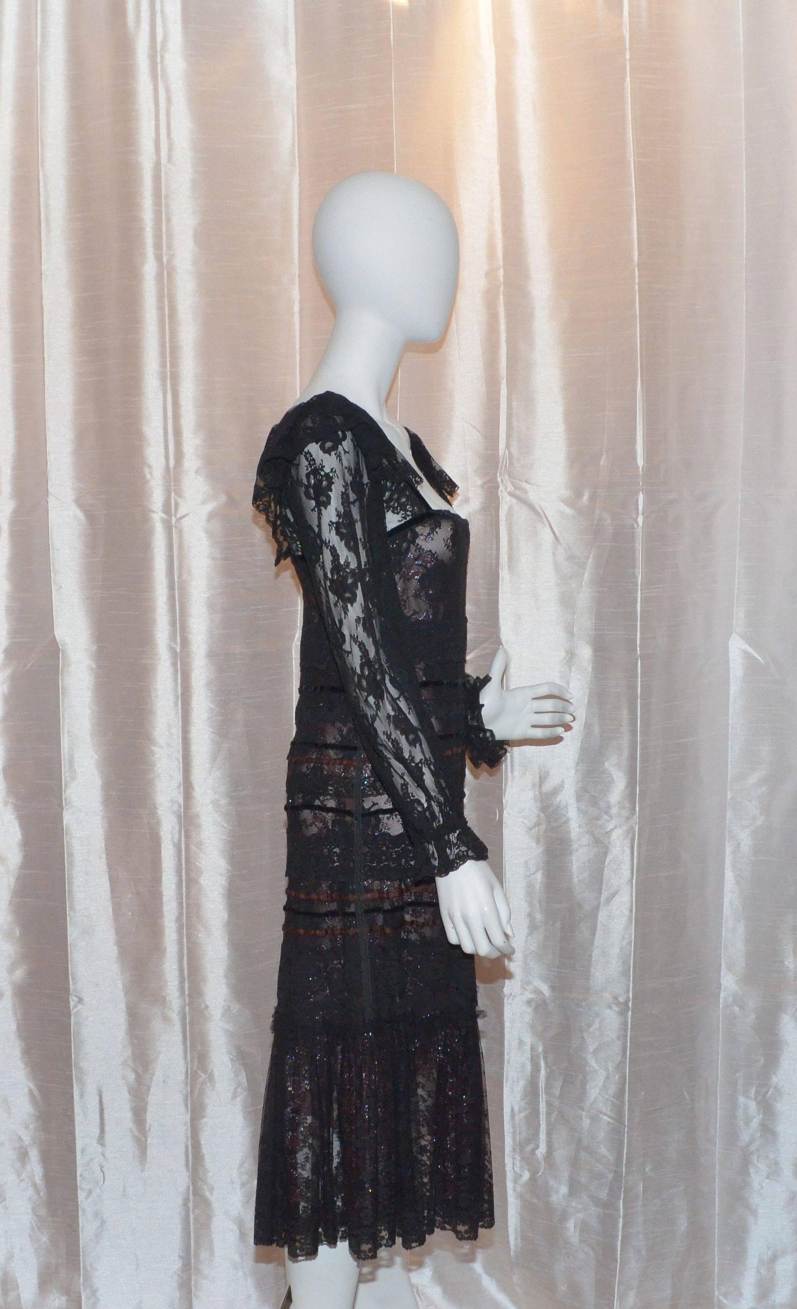 Very lightweight vintage Giorgio Sant Angelo dress features a square neckline trimmed with black velvet ribbon. Bodice of dress has both black velvet and rust satin ribbon. Lined in a sheer rust lace with silver and maroon flowers. Silver shines