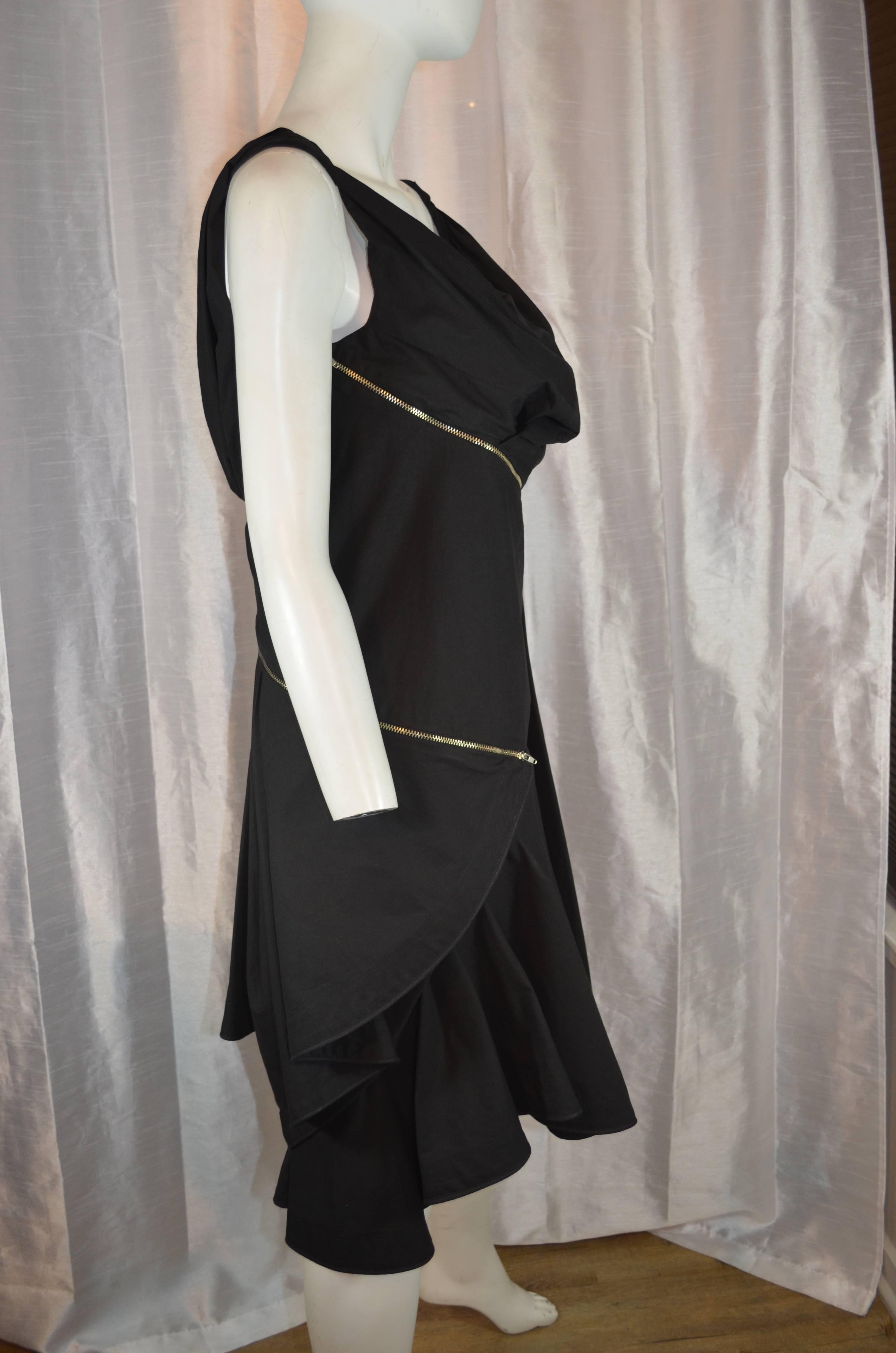 Avant-garde Hussein Chalayan black zippered mini sun dress with an asymmetrical hem line and cowl neckline on the front and back of the dress. The hemline can be easily changed by unzipping from the bottom to form an asymetrical longer hem on one