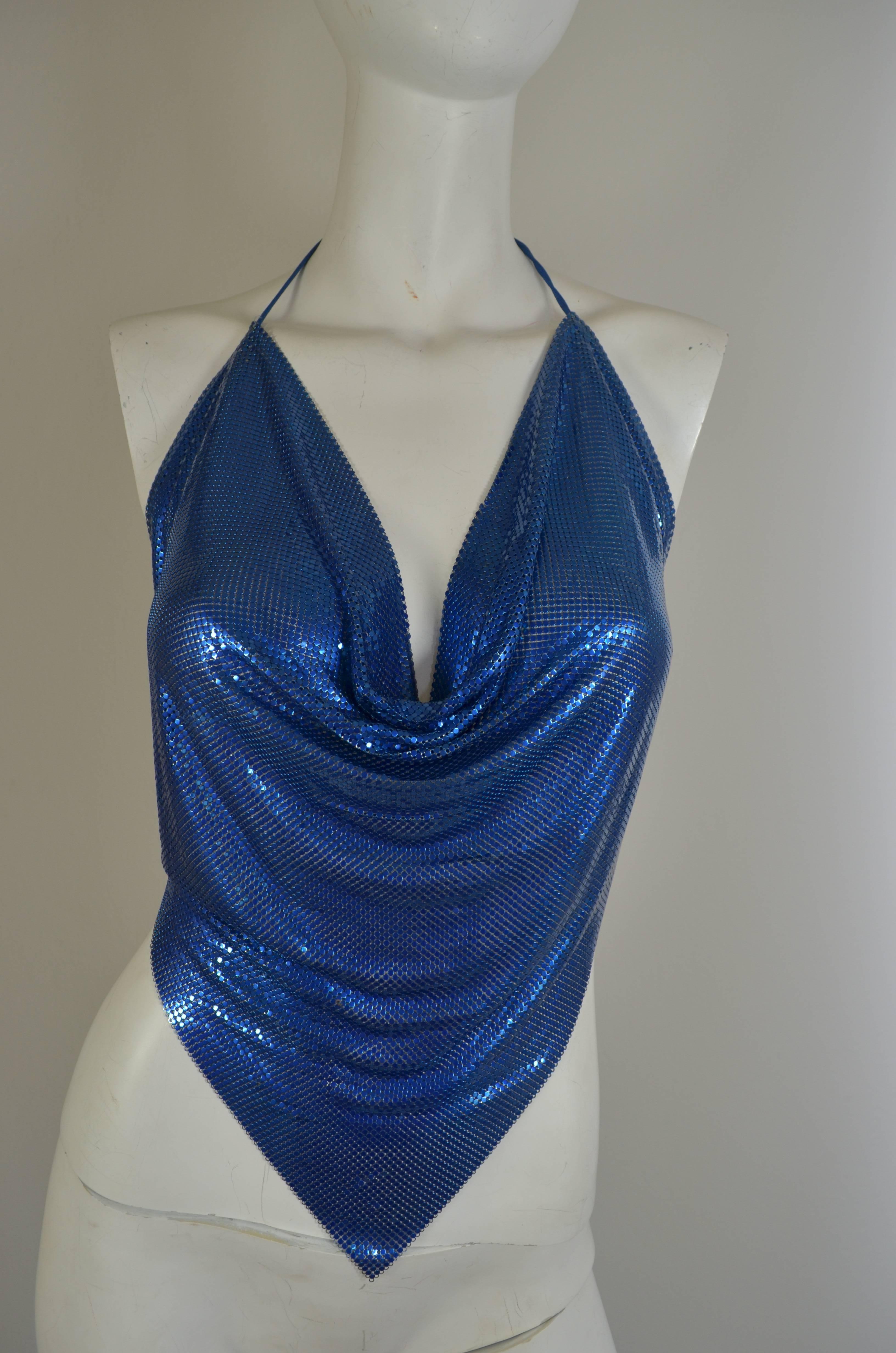 Whiting Davis 1970's or early 1980's iridescent blue plated brass halter top. Wearable body jewelry. Ties at neck and back. Felt at sides, label missing. Vintage top had good weight to it which adds to the beat of how the top falls on the body when