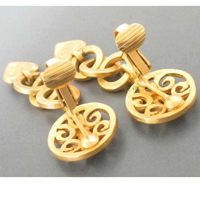 Women's Vintage CHANEL rare golden dangling earrings with hoop chain, heart, CC motif
