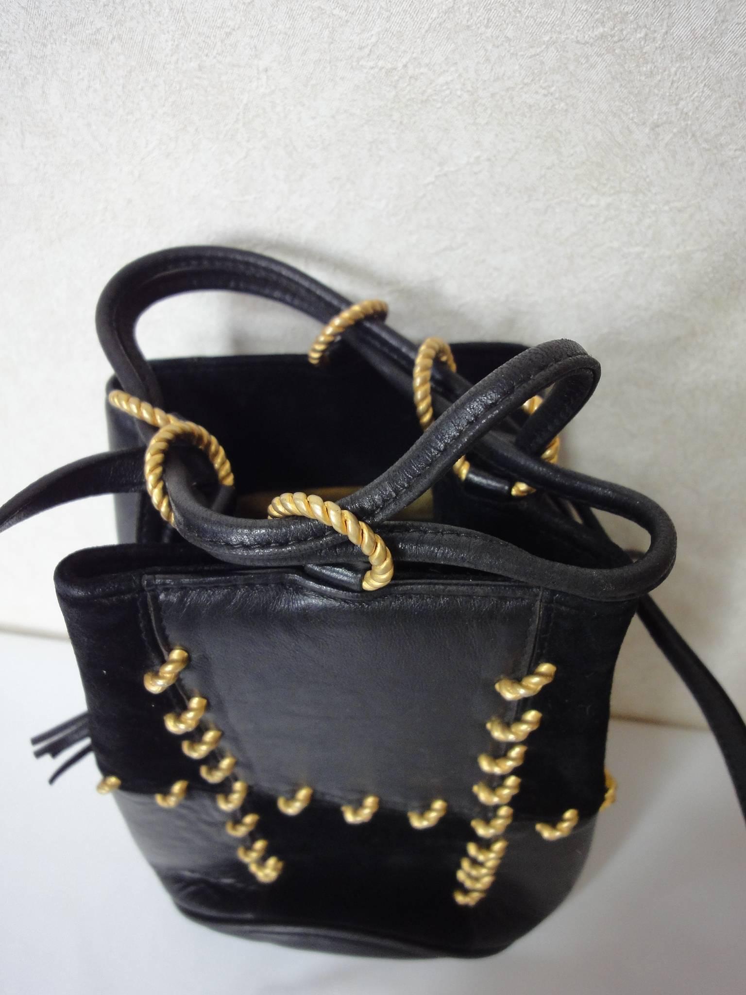 Women's Vintage Salvatore Ferragamo black leather mini shoulder purse with drawstrings