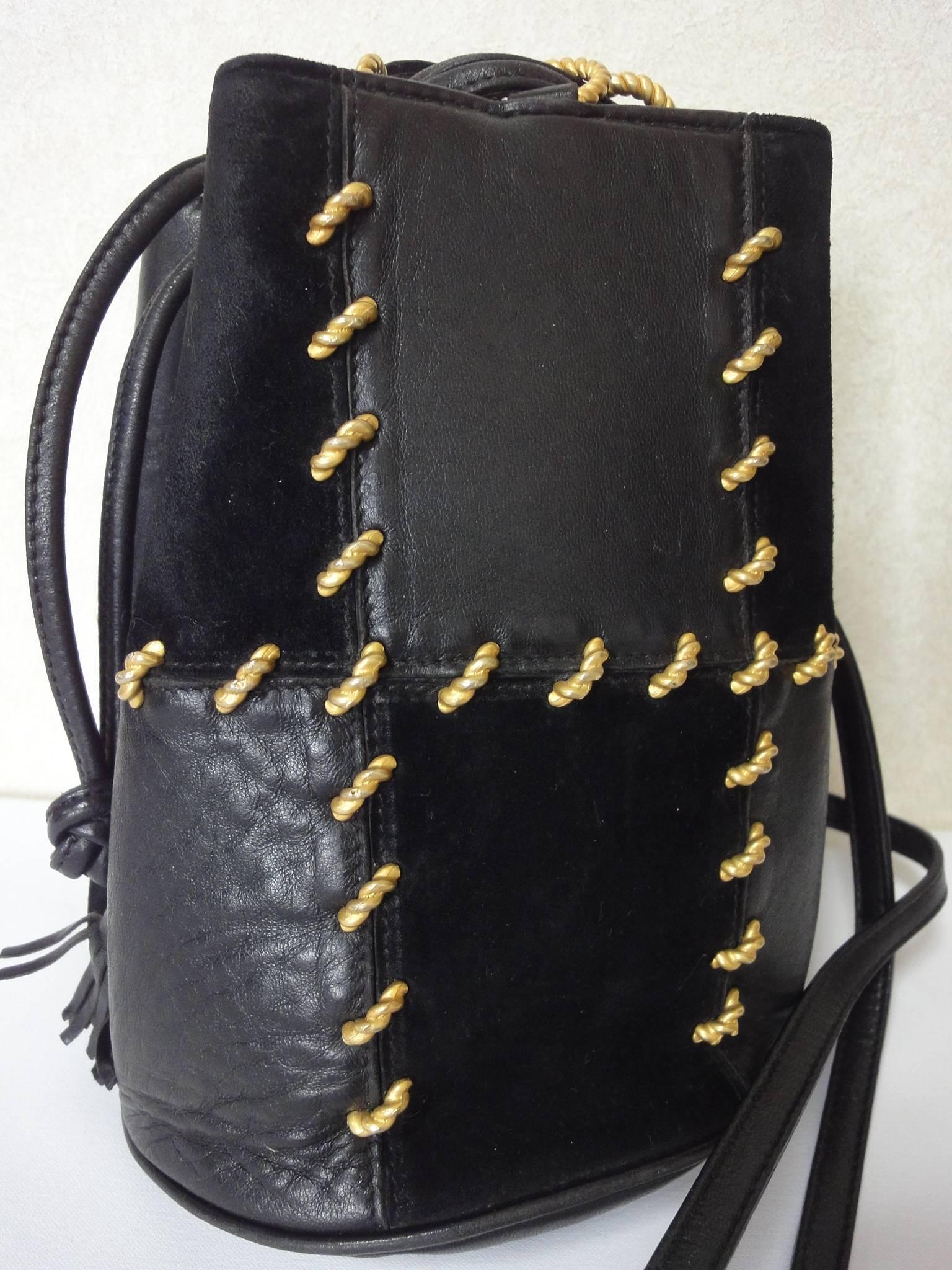Vintage Salvatore Ferragamo black leather mini shoulder purse with drawstrings 1