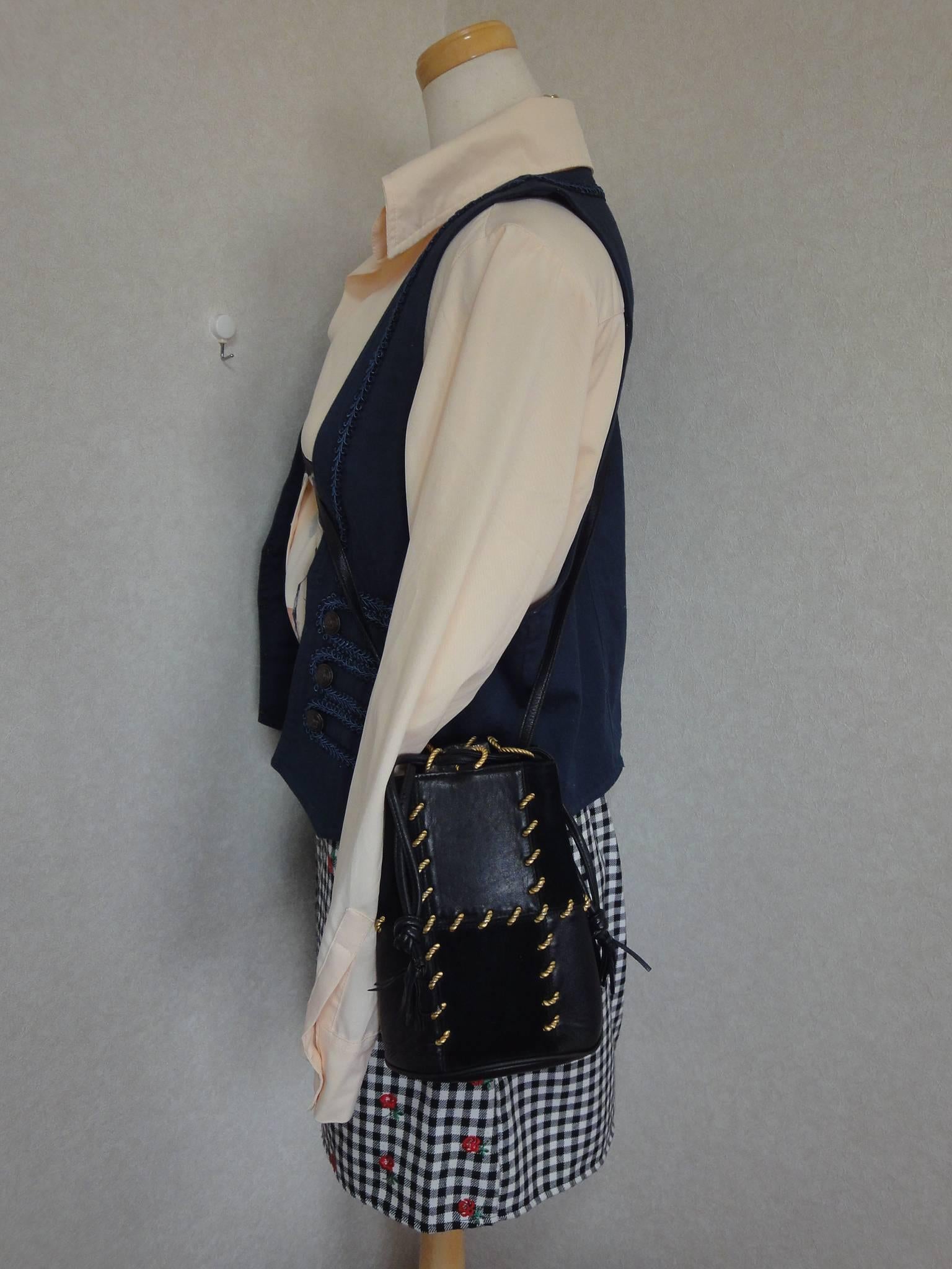 Vintage Salvatore Ferragamo black leather mini shoulder purse with drawstrings 6