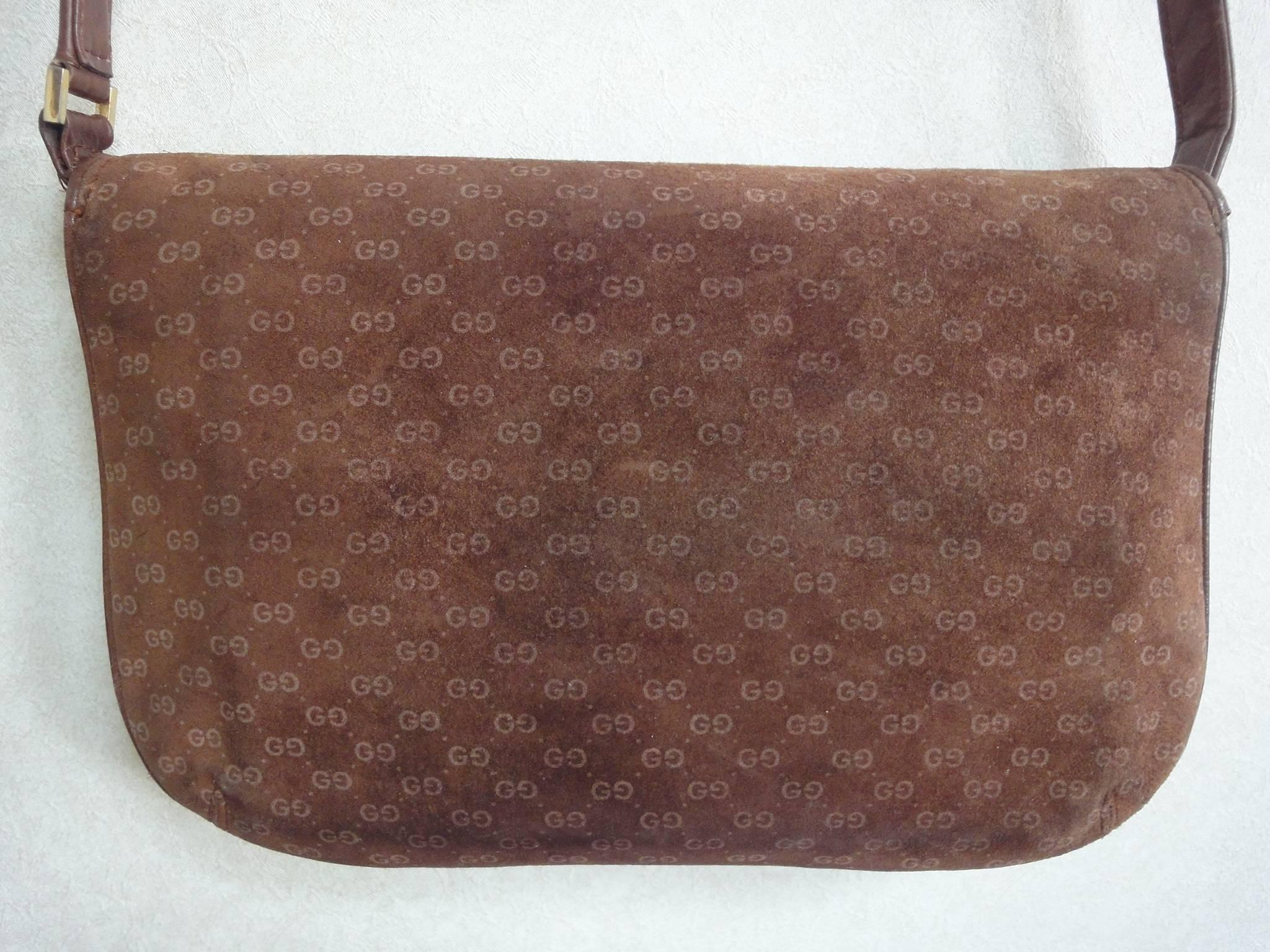 Vintage Gucci dark brown suede leather clutch shoulder bag with micro, mini GG prints allover. Rare, Collectible Masterpiece

This is a vintage darkbrown genuine suede leather clutch shoulder purse from Gucci. If you are a vintage Gucci collector