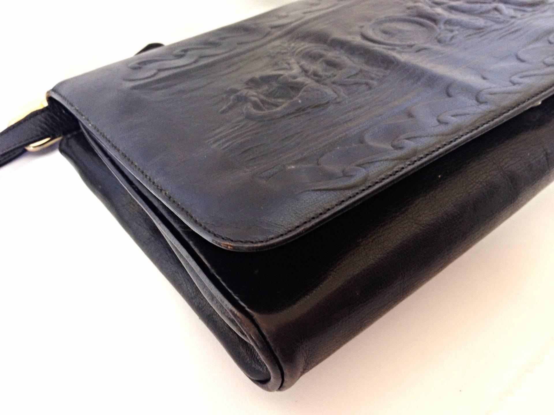 Women's or Men's Vintage FENDI black leather shoulder bag, large clutch purse with embossed art, 