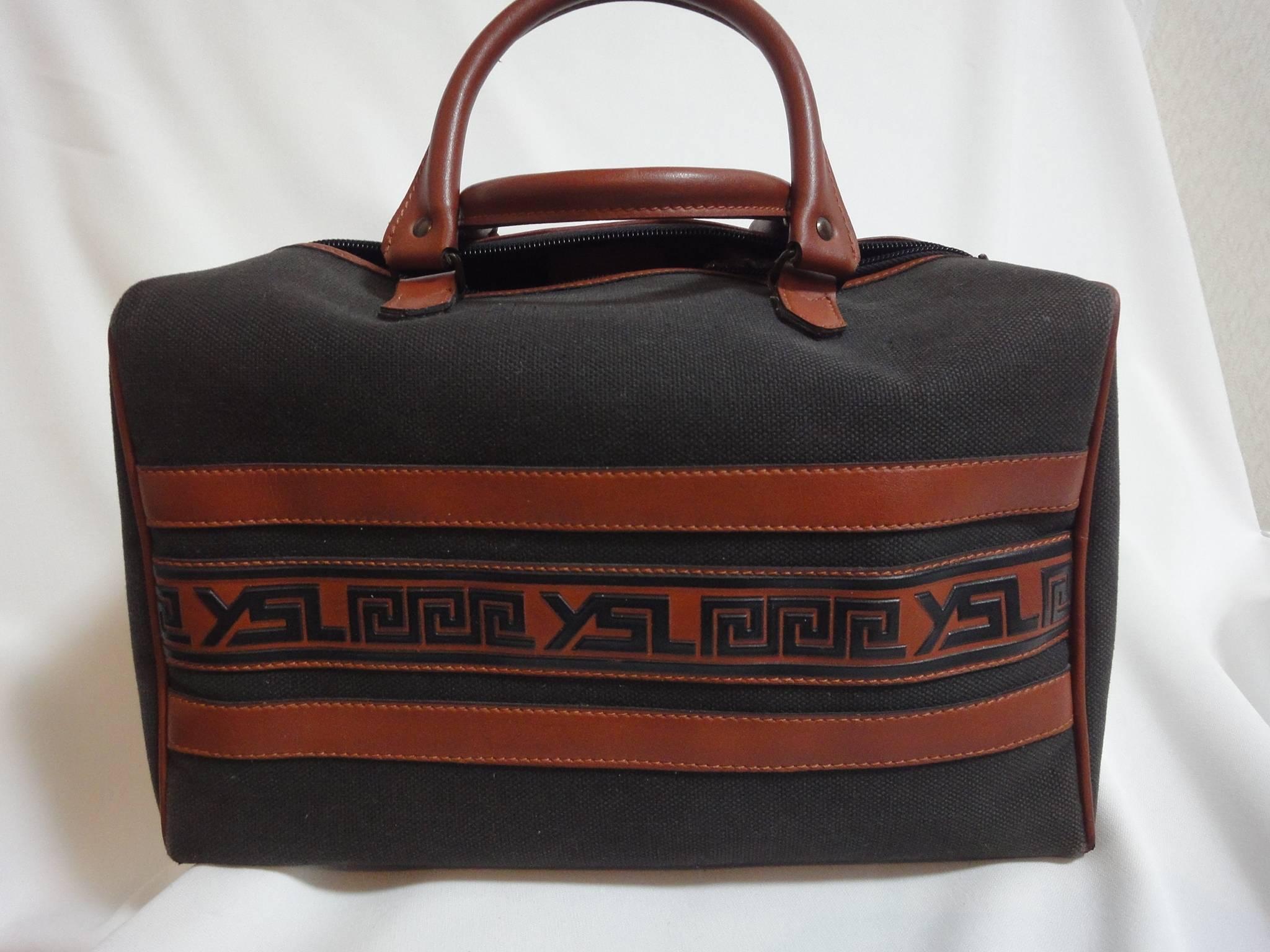 Vintage Yves Saint Laurent charcoal grey canvas and brown leather mini duffle ba For Sale 2