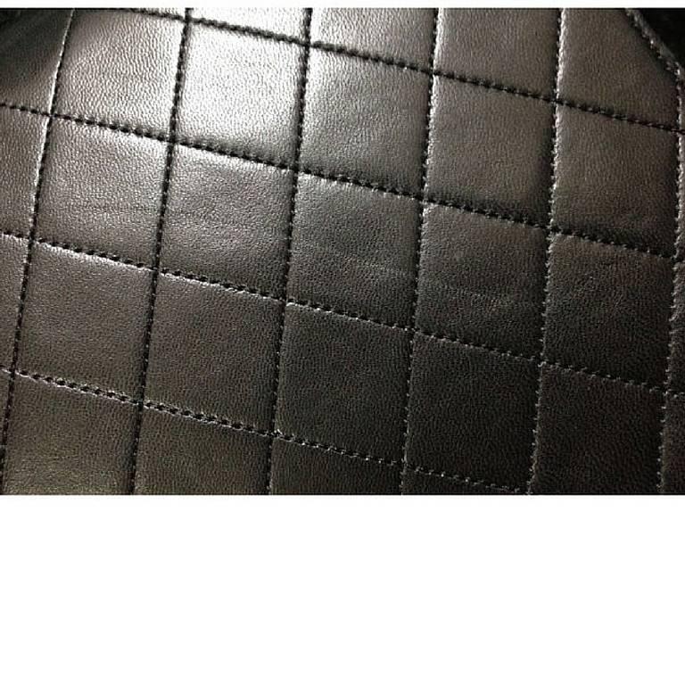 Black Vintage CHANEL black quilted lambskin classic 2.55 shoulder purse with golden CC