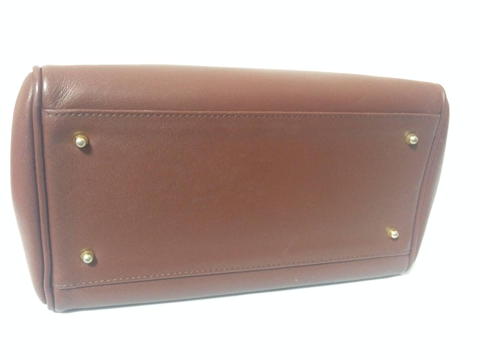 Brown Vintage Valentino Garavani, brick brown leather mini handbag with golden logo 