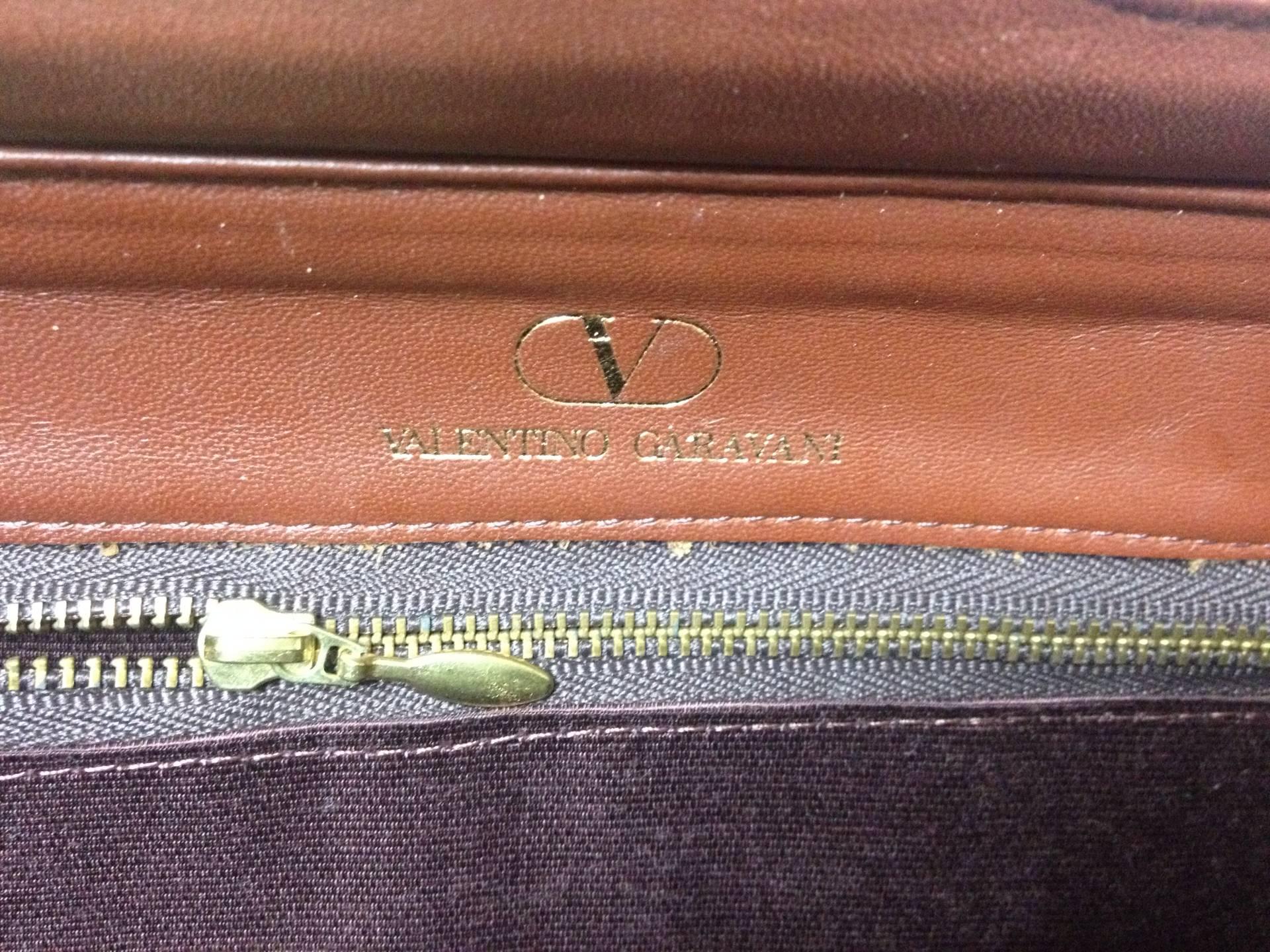 Women's Vintage Valentino Garavani, brick brown leather mini handbag with golden logo 