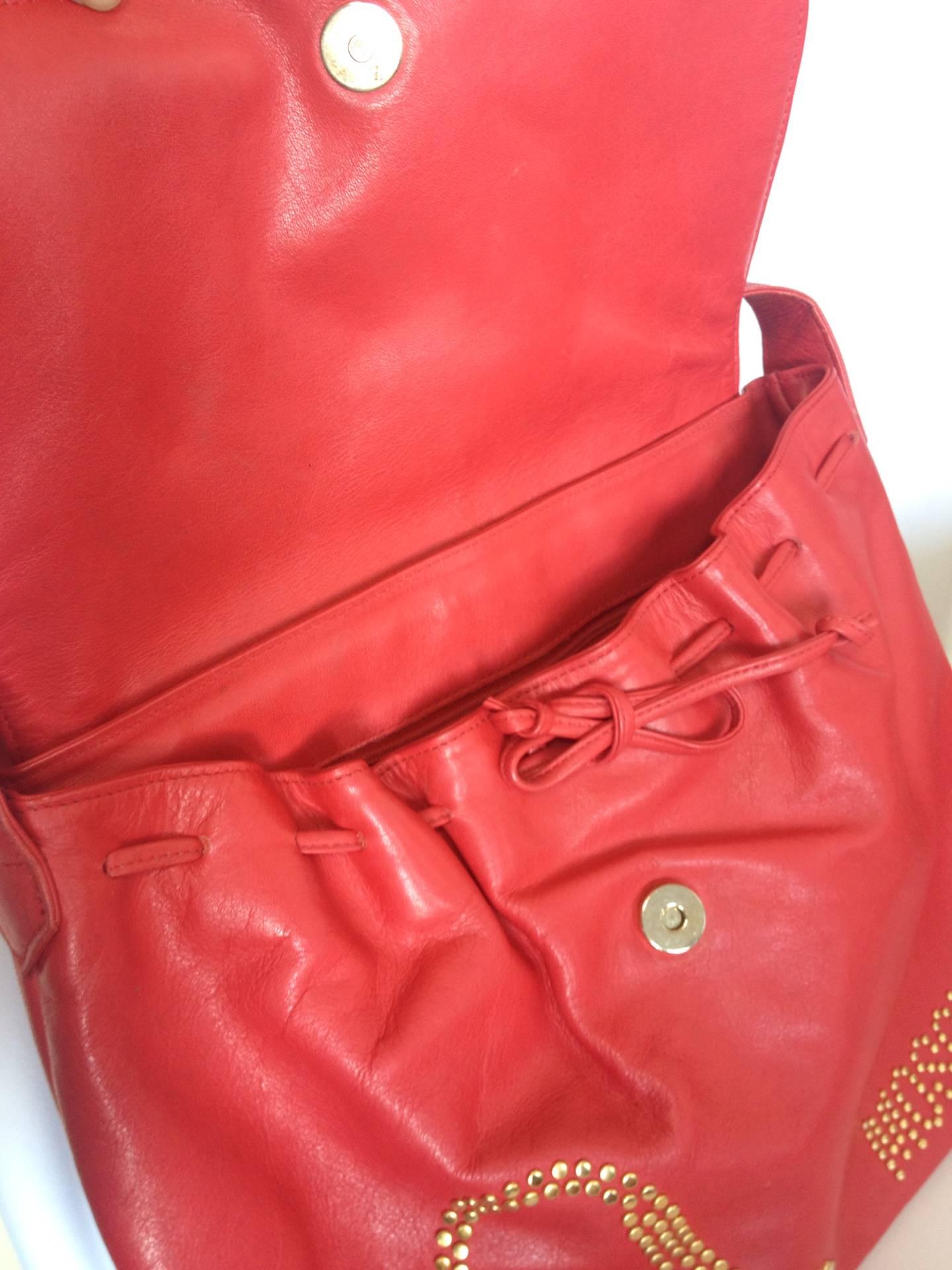 red leather messenger bag