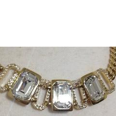 MINT. Vintage Givenchy gold tone chain statement necklace with crystal stones.