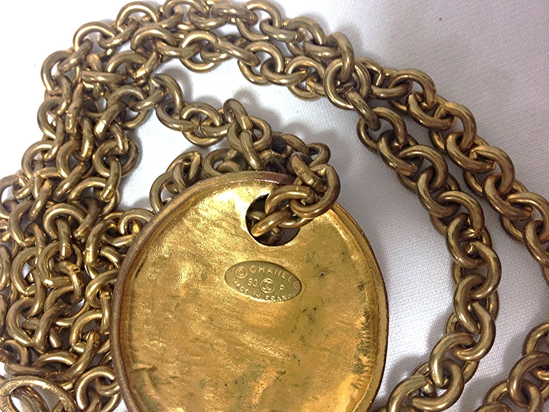 Vintage CHANEL gold tone long chain necklace with a round coin, medal cc top For Sale 2