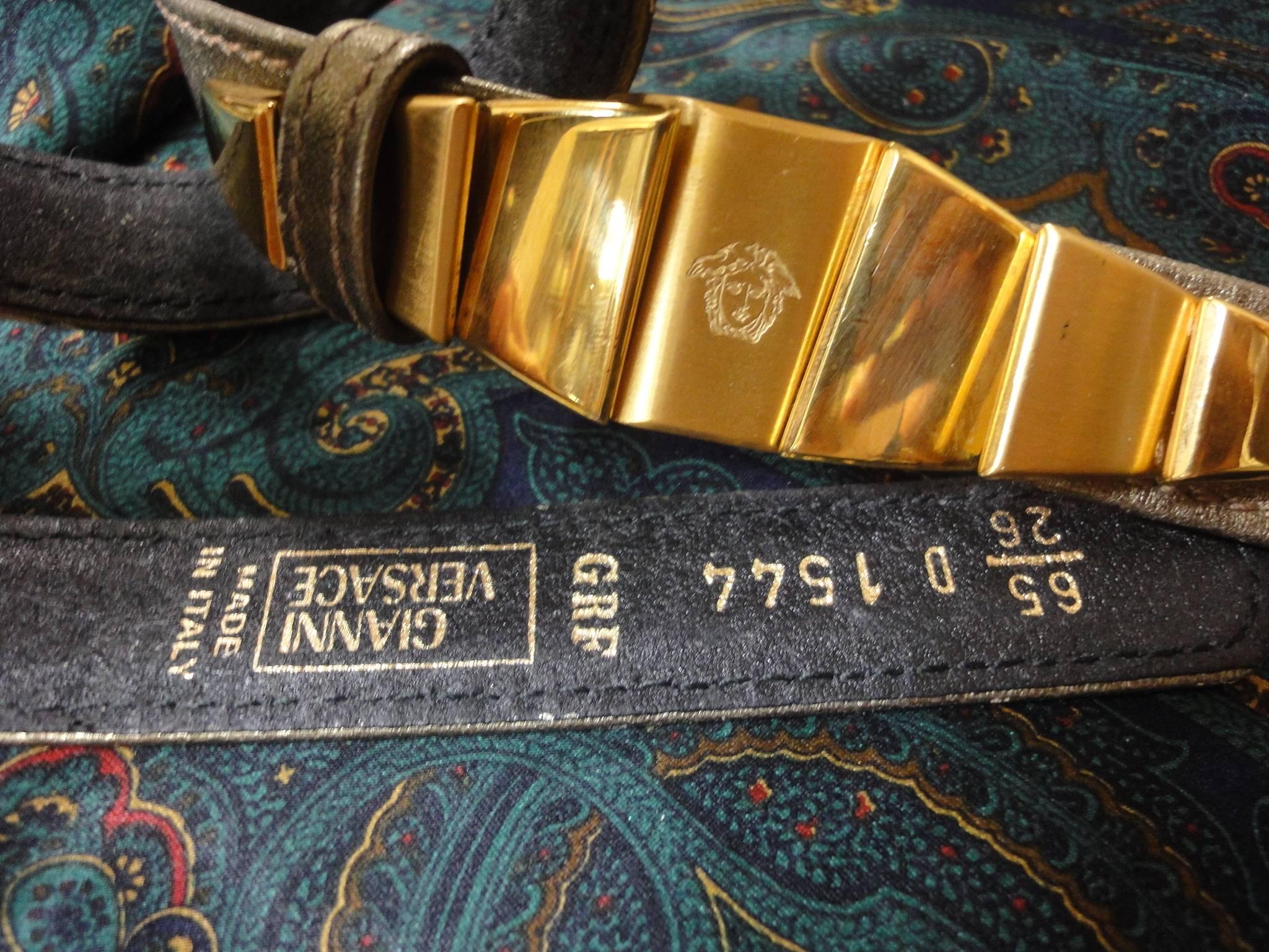 Brown Vintage Gianni Versace skinny gold bronze leather belt with golden hardware  For Sale