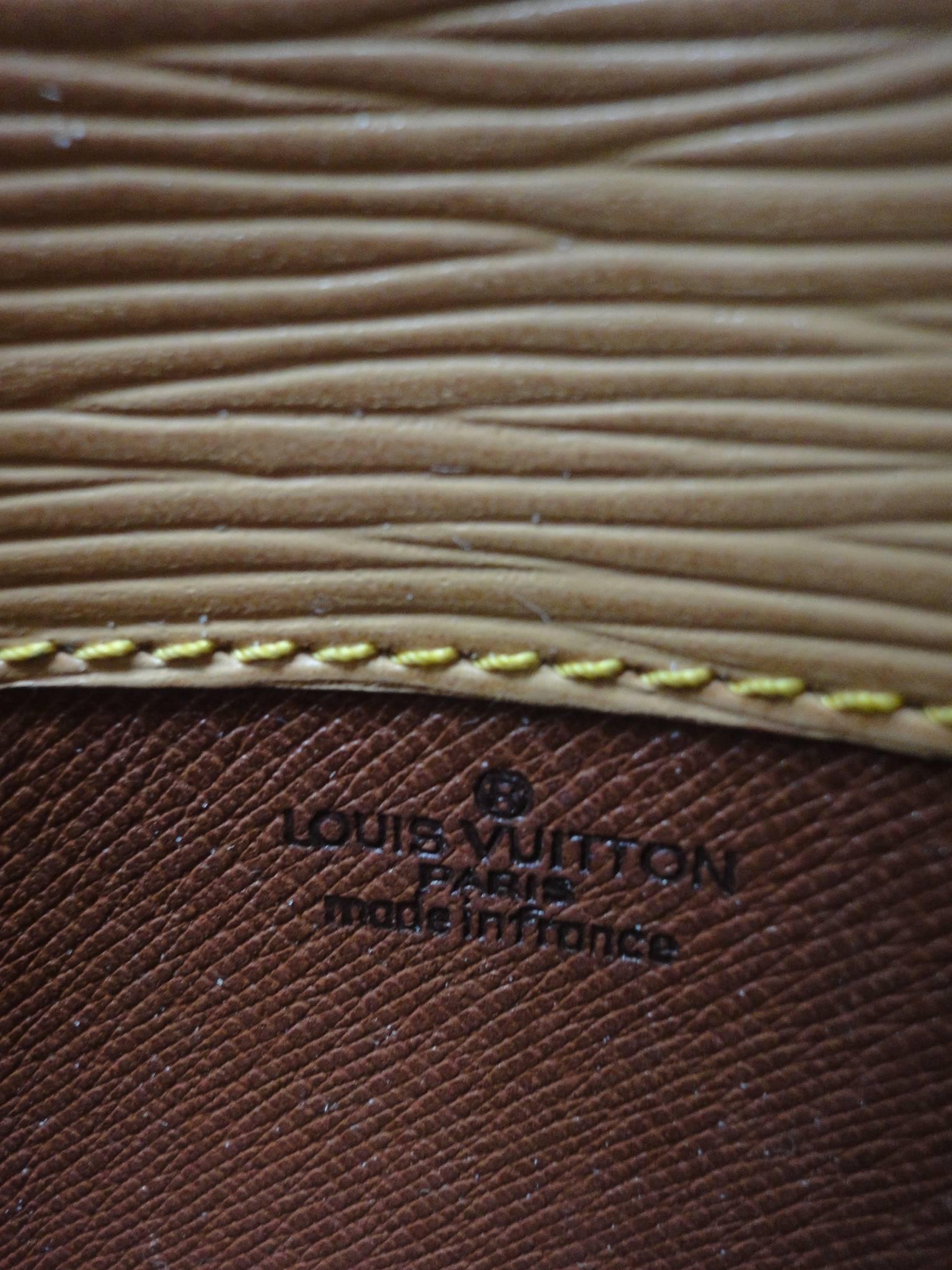 Women's or Men's Vintage Louis Vuitton cream beige yellow epi leather, Cartouchiere shoulder bag.