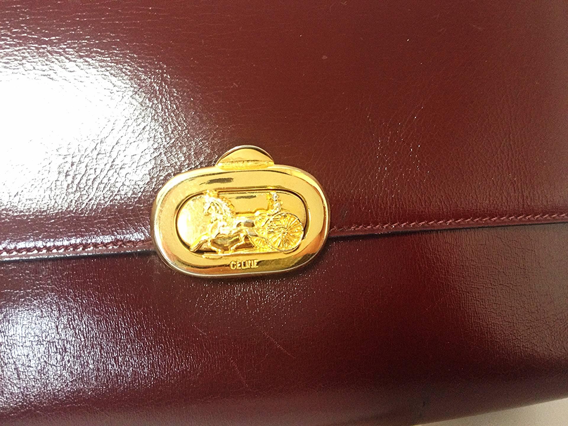 intage CELINE genuine wine brown leather clutch bag with golden carriage logo. In Good Condition In Kashiwa, Chiba