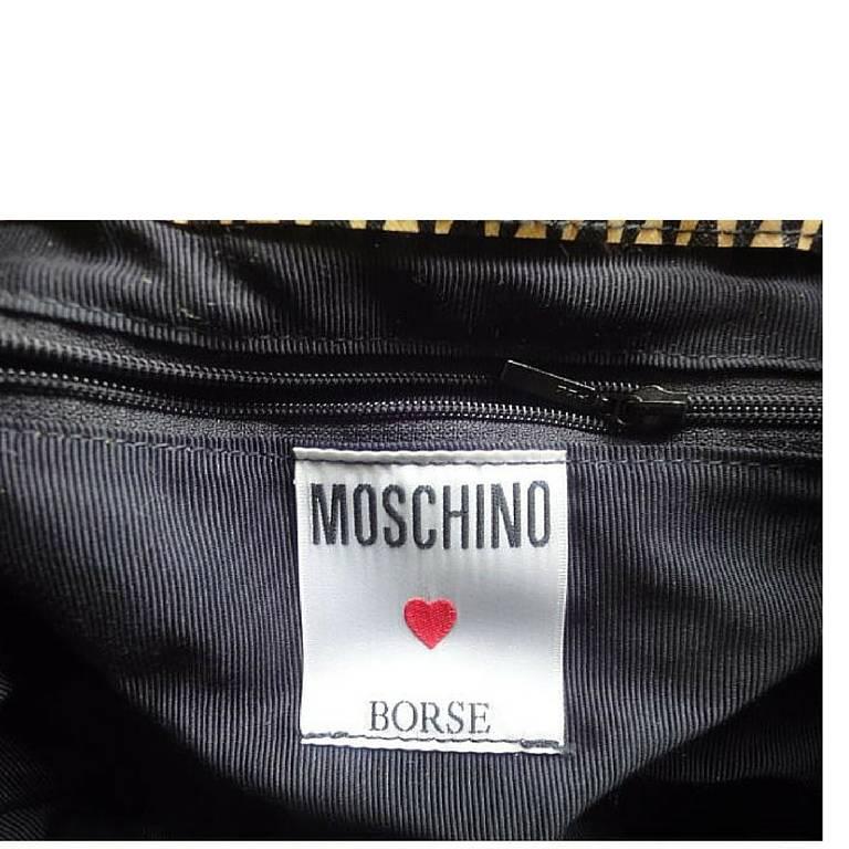 Women's Vintage MOSCHINO black and ivory logo print hobo bucket shoulder bag. For Sale
