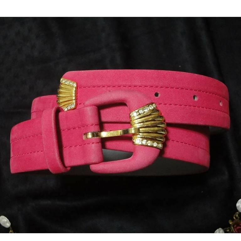 80's Vintage Christian Dior tropical pink suede leather belt with gold motif and crystal stones. Mod and chic belt from Dior.

Introducing a 80's vintage Christian Dior suede leather belt! 
Great to be used as high waist belt on your favorite