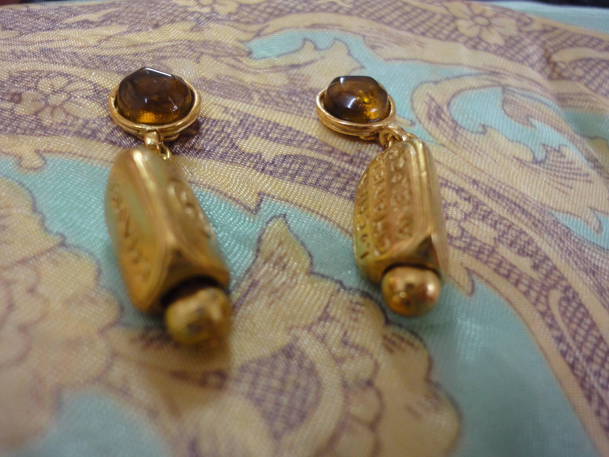 Women's Vintage CHANEL golden dangling stud, pierced earrings with round brown gripoix