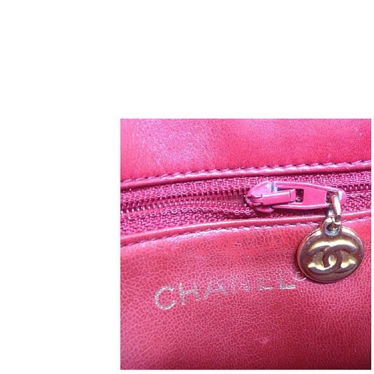 Vintage CHANEL lipstick red lambskin pouch with golden CC closure in chevron V. 1