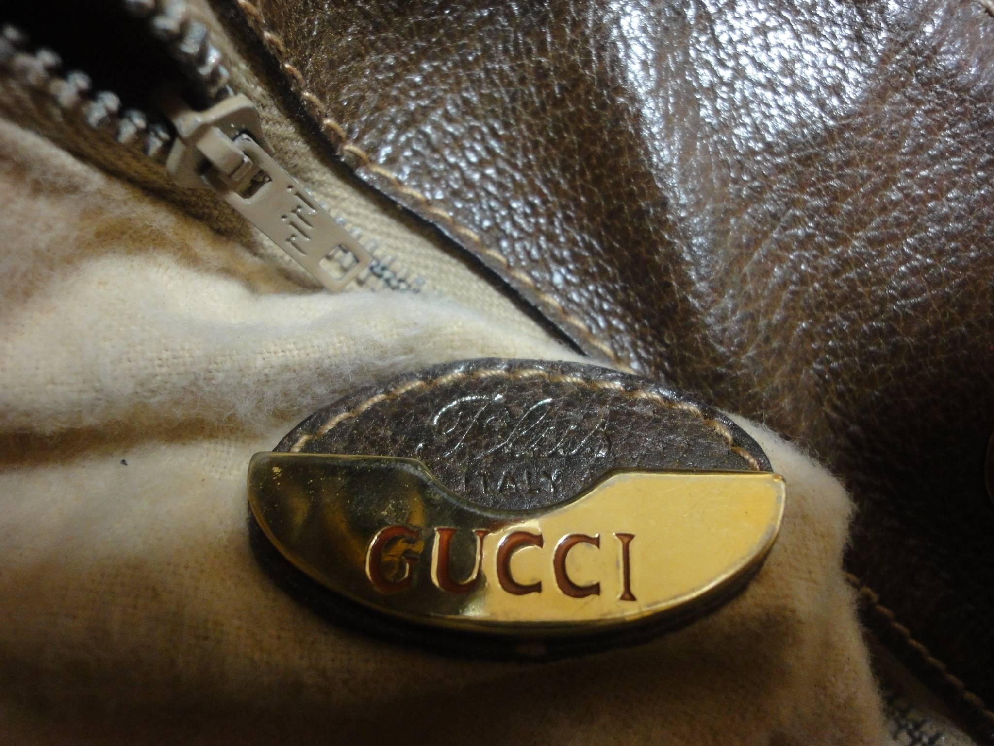 Gray 1980s Vintage Gucci Plus monogram and leather hobo bucket purse with drawstrings