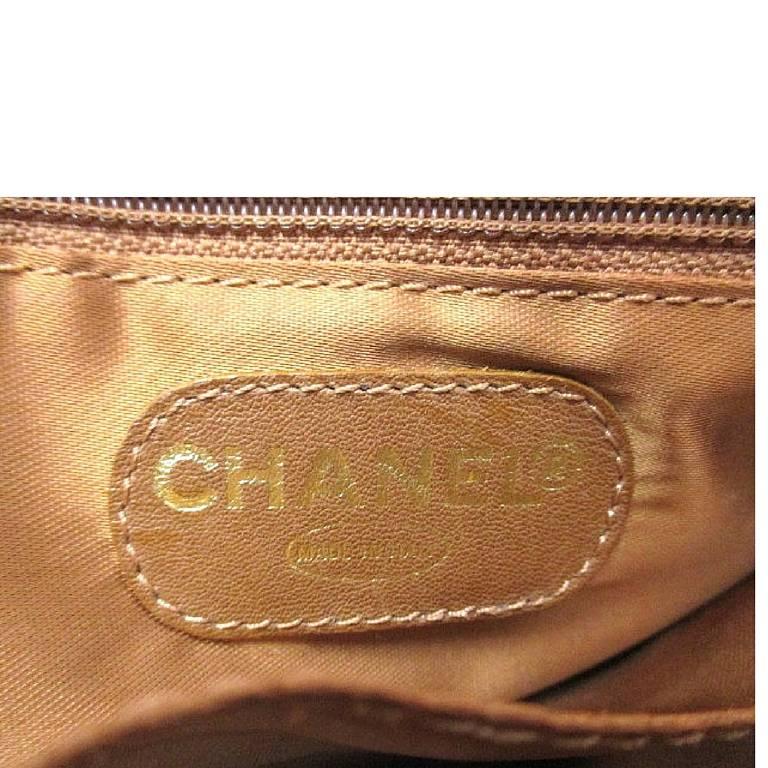 1990s. Vintage CHANEL camel brown caviar leather square shoulder tote bag. 1