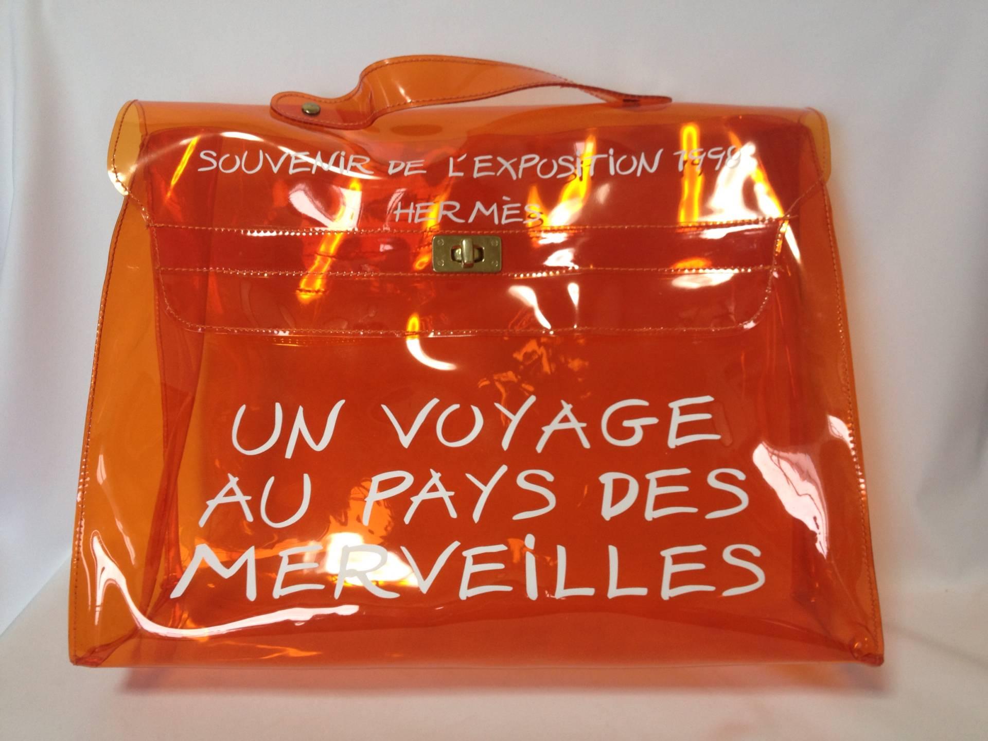 MINT condition. Hermes a rare transparent Vintage orange vinyl Kelly bag Japan Limited Edition, Japan Department Store.

SPECIAL piece for Hermes vintage collector or lover! 
Don't miss!!

This is a MINT conditioned, orange vinyl Kelly bag from