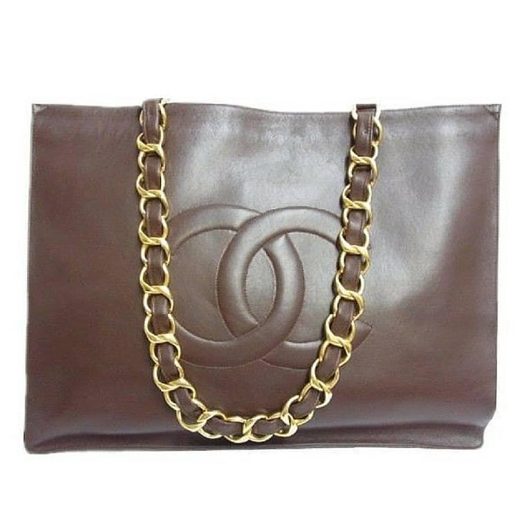 Vintage CHANEL brown calfskin large tote bag with gold tone chain handles and CC
