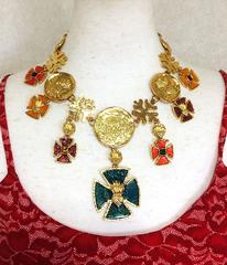 MINT. Vintage Yves Saint Laurent statement necklace with enamel cross charms.