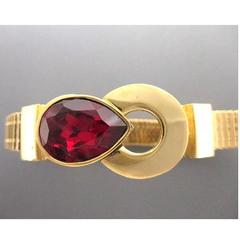 MINT. Vintage Givenchy golden flat chain bracelet with red Swarovski teardrop.