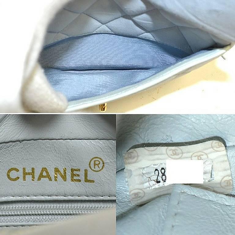 Women's Vintage CHANEL genuine suede leather light blue camera shoulder bag with fringe.