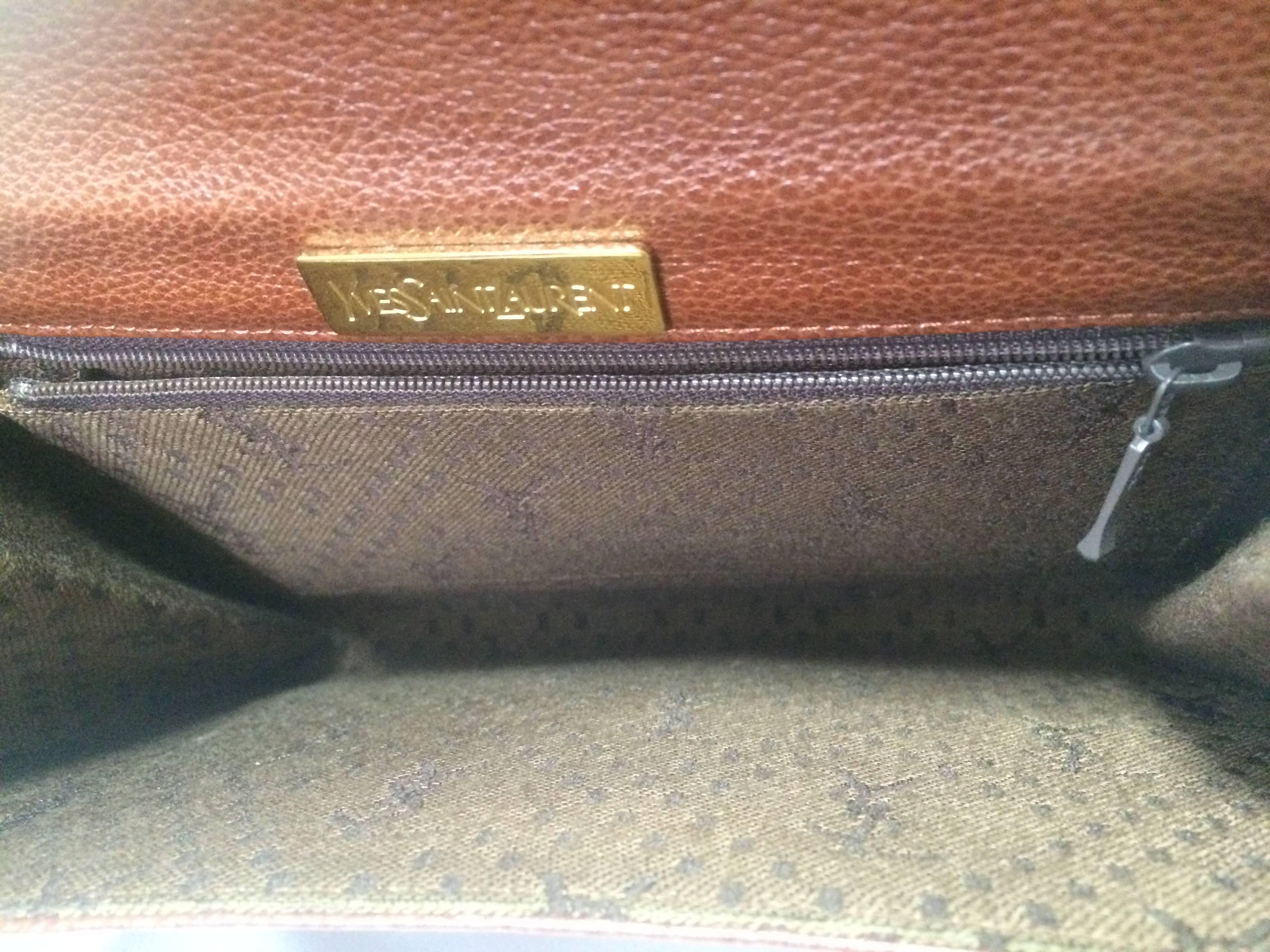Vintage Yves Saint Laurent genuine brown leather clutch purse with beak tip flap 2