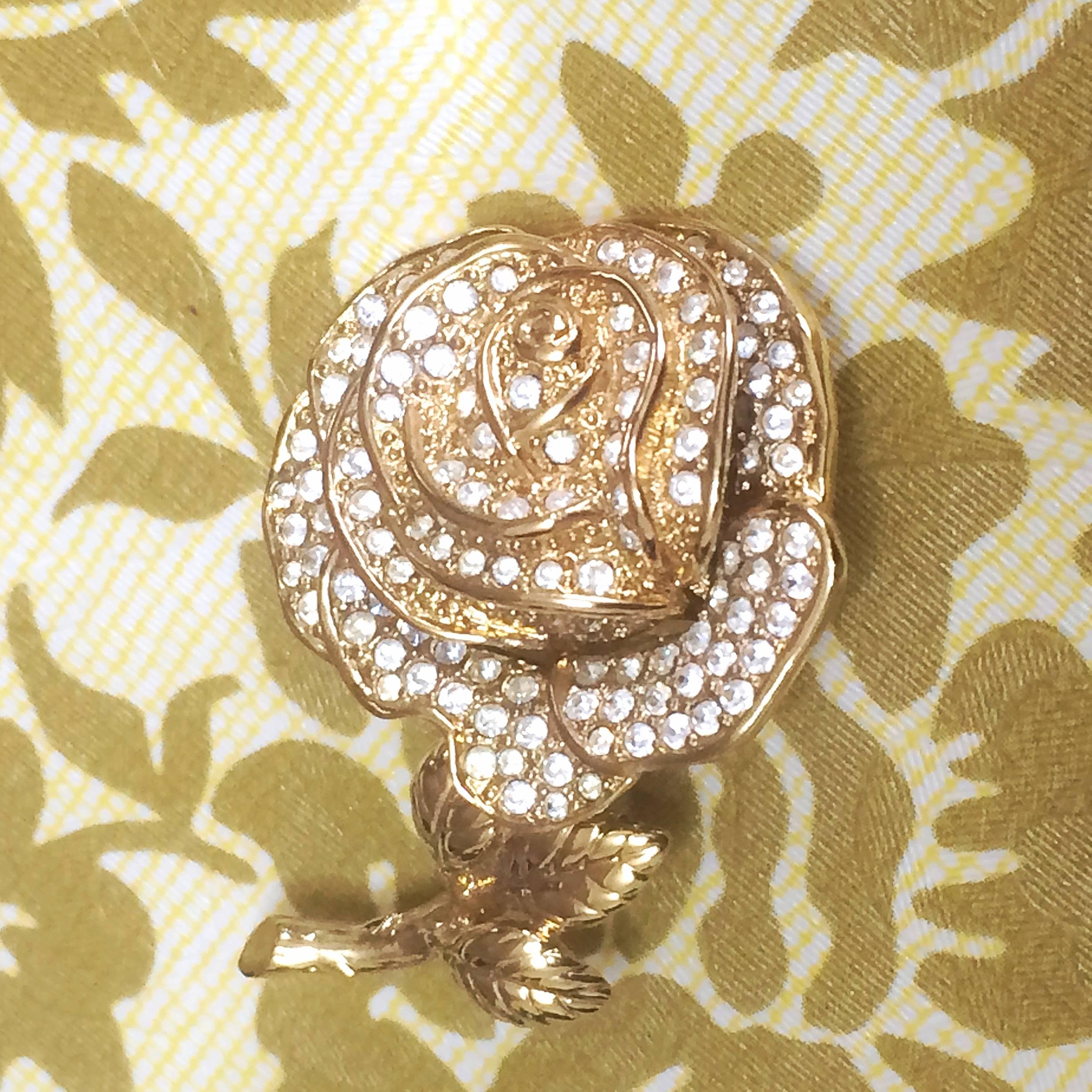 1990s. MINT. Vintage Christian Dior rose flower brooch with rhinestone crystals. Can also be hat, scarf, jacket pin.

Introducing another fabulous jewelry piece from Christian Dior back in the 90's.
In MINT/excellent vintage condition, rose