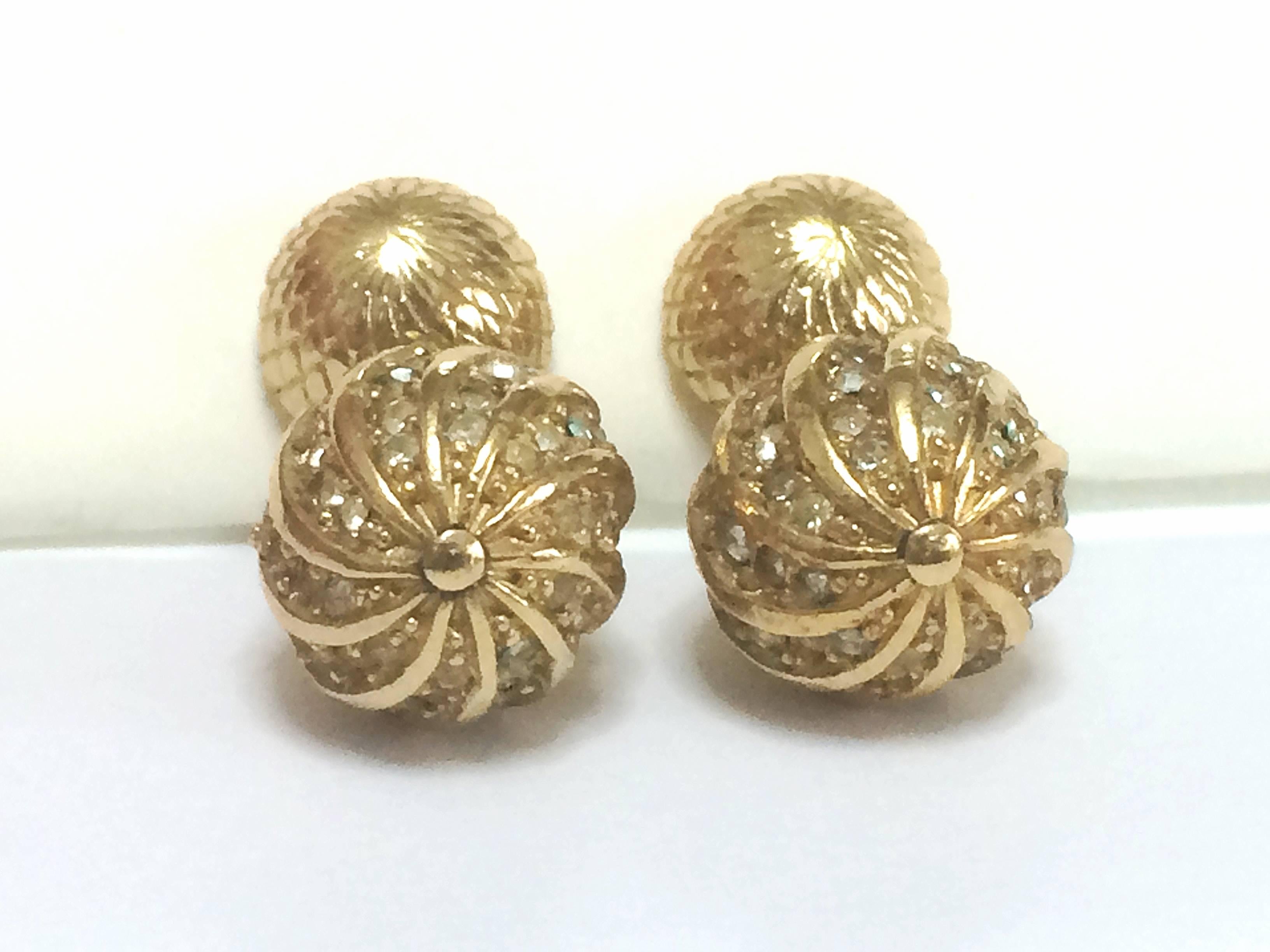 1990s. Vintage Christian Dior golden ball charm dangling earrings with rhinestone crystals.

Introducing another vintage jewelry piece from Christian Dior back in the 90's.
Gold tone 2 elaborated ball charm dangling earrings with rhinestone